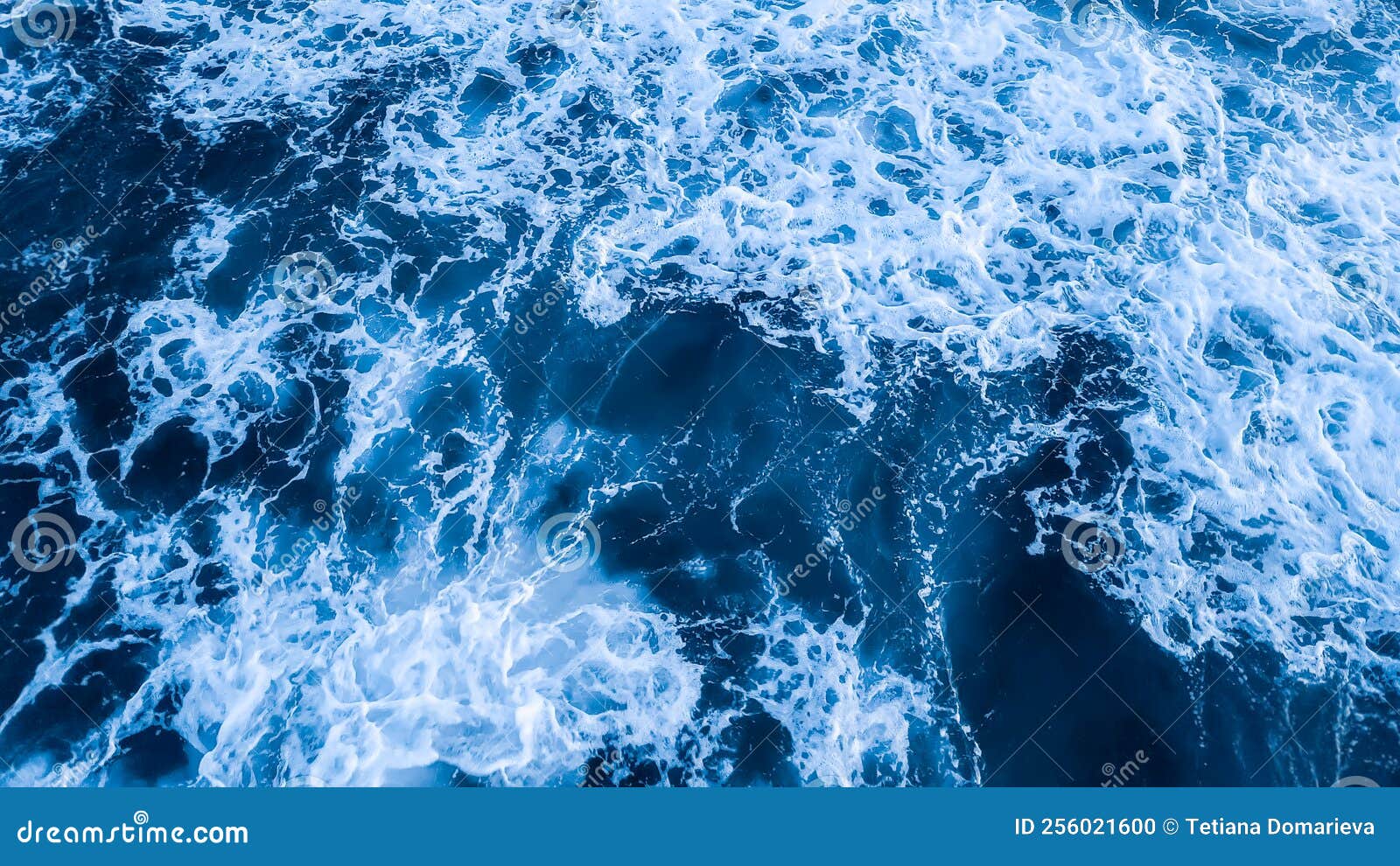Top View Aerial Photography White Sea Foam Against the Background of