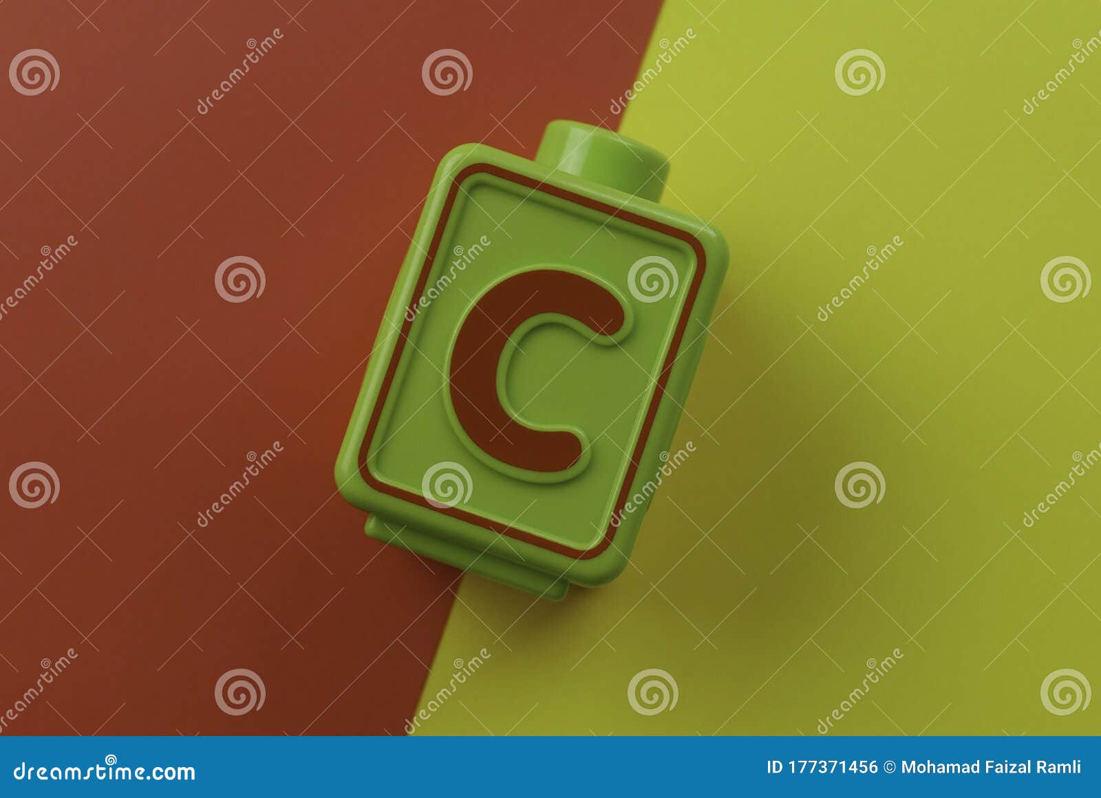 Top View of Alphabet C on Two Color Background Which are Red and Yellow
