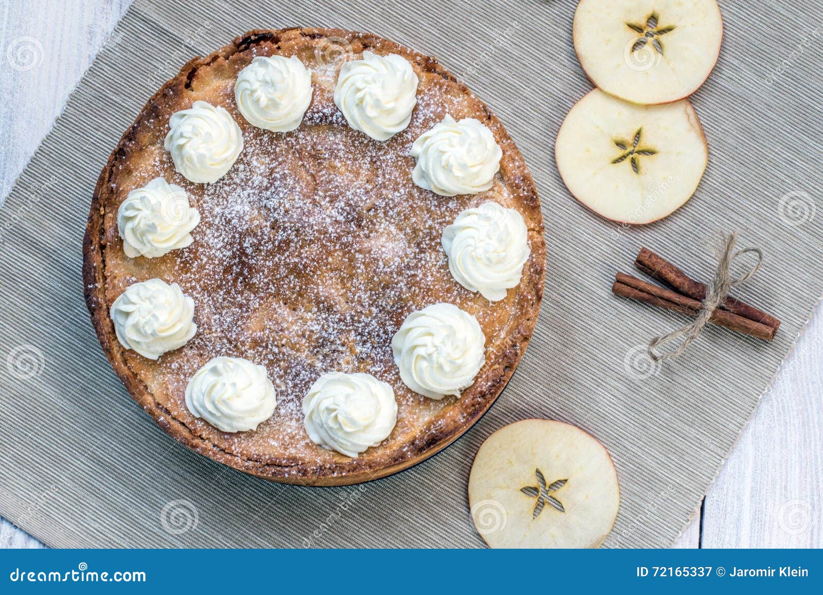 Top View on Apple Pie with Whipped Cream with Cinnamon and Apple Stock
