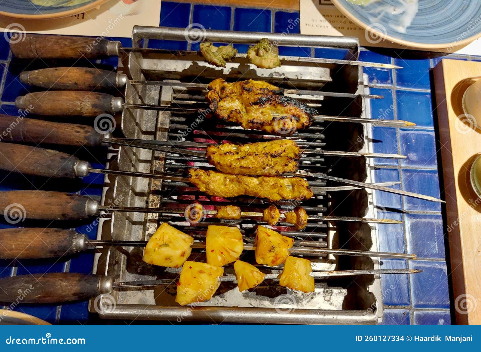 Top View of Barbecue Starters and Appetizers Fish, Chicken and