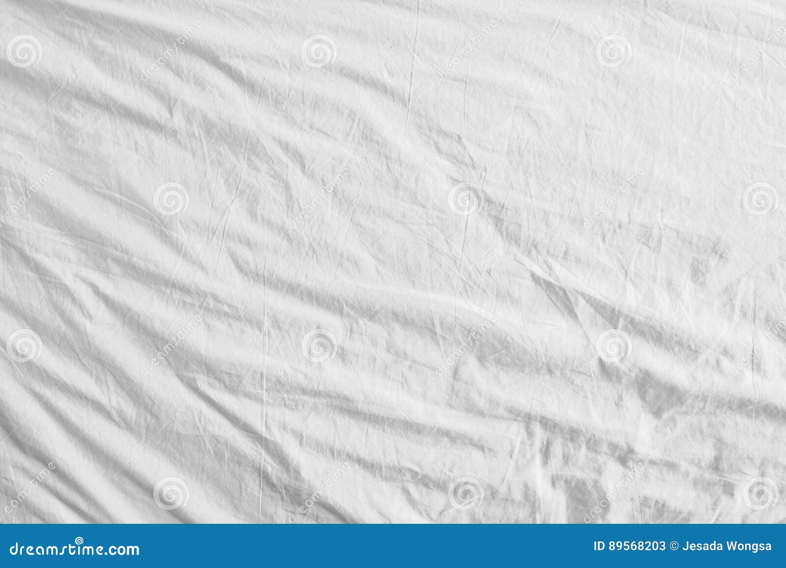 Top View of Bedding Sheets or White Fabric Wrinkle Texture Background
