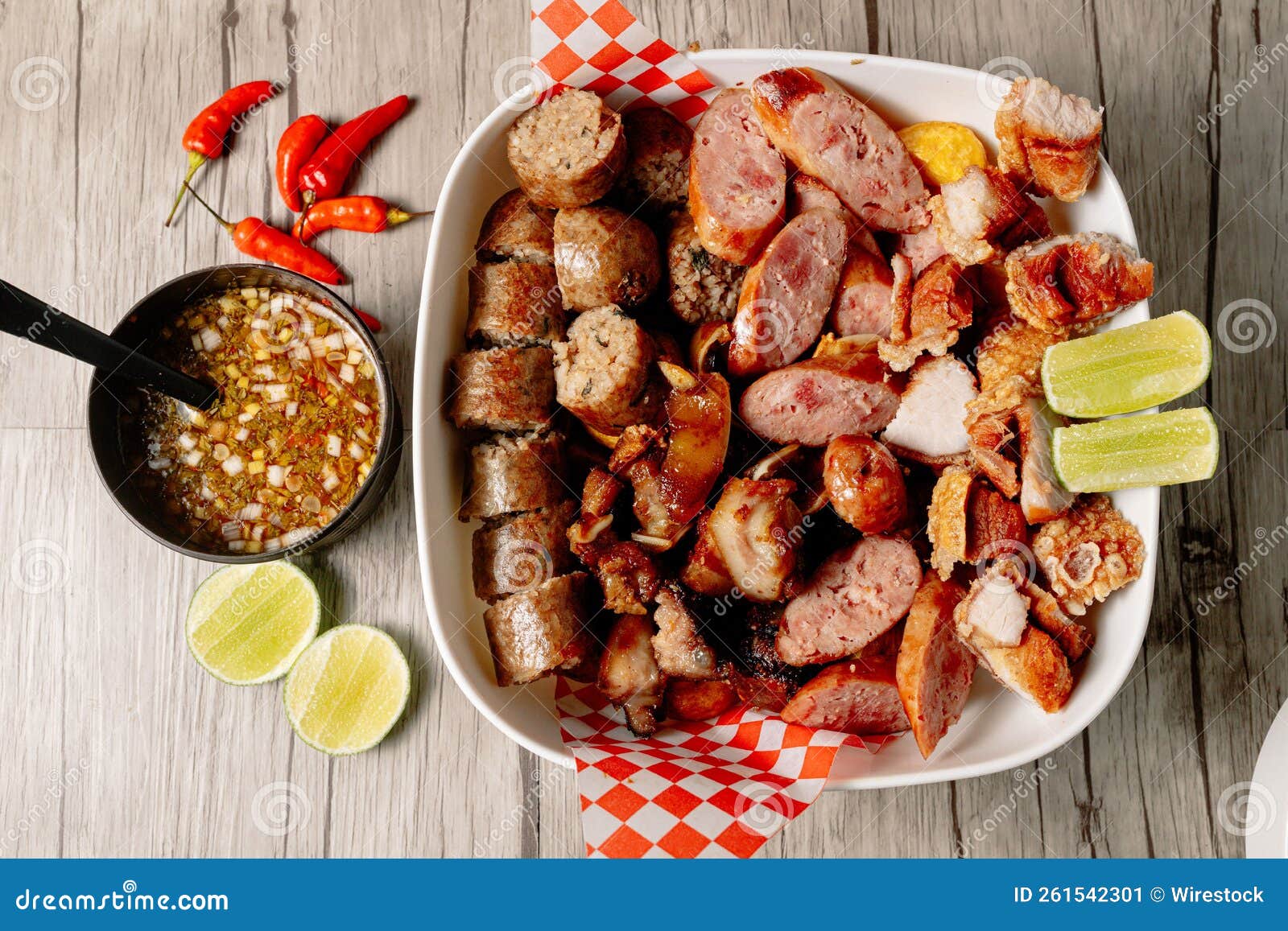 Top View of a Big Bowl of Different Sliced Meats and a Bowl of