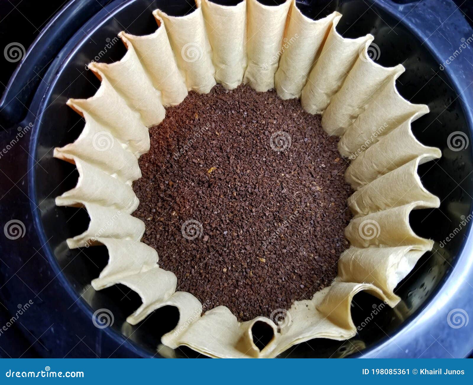 Top View of Black Coffee Powder Inside of Paper Filter Stock Image