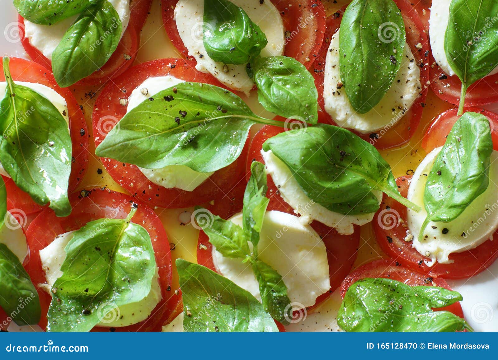 Top View on Caprese Salad, White Mozzarella, Red Tomatoes and Green ...