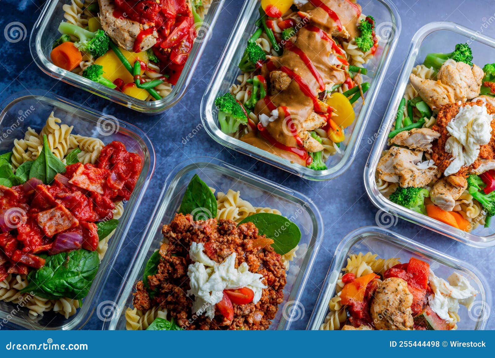 Top View of Casseroles of Pasta with Vegetables and Chicken Breast