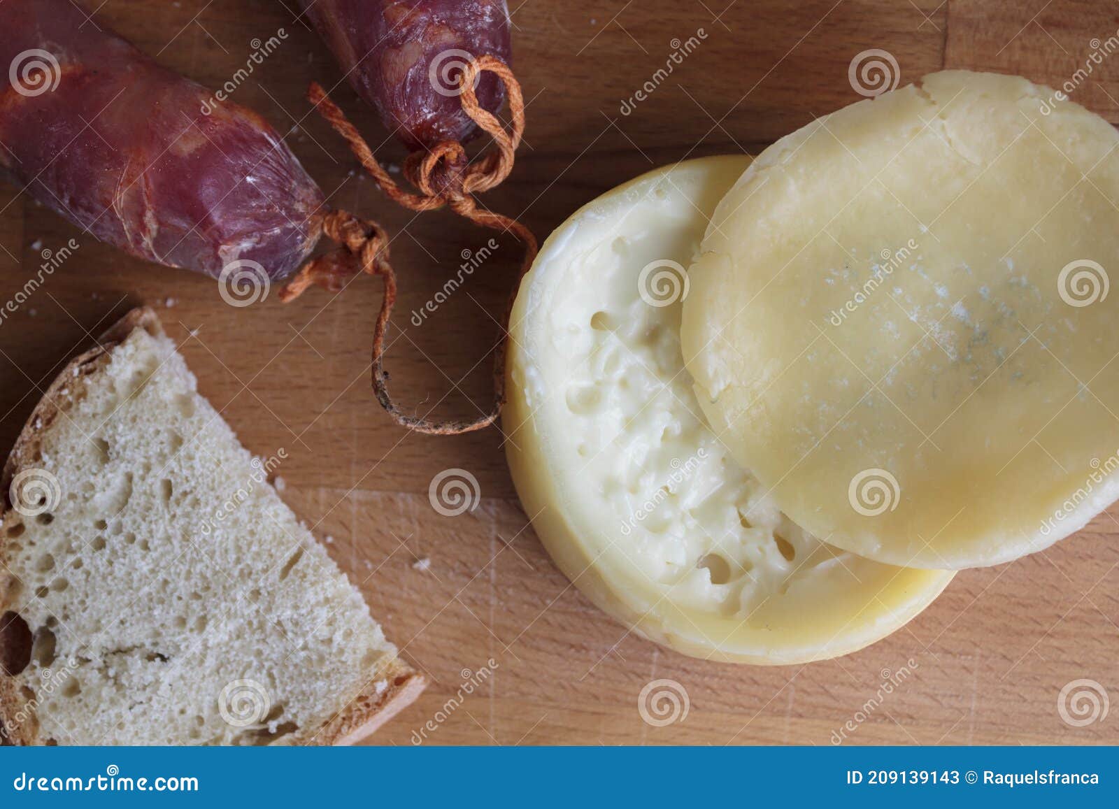 top view of cheese  chorizo and a slice of bread