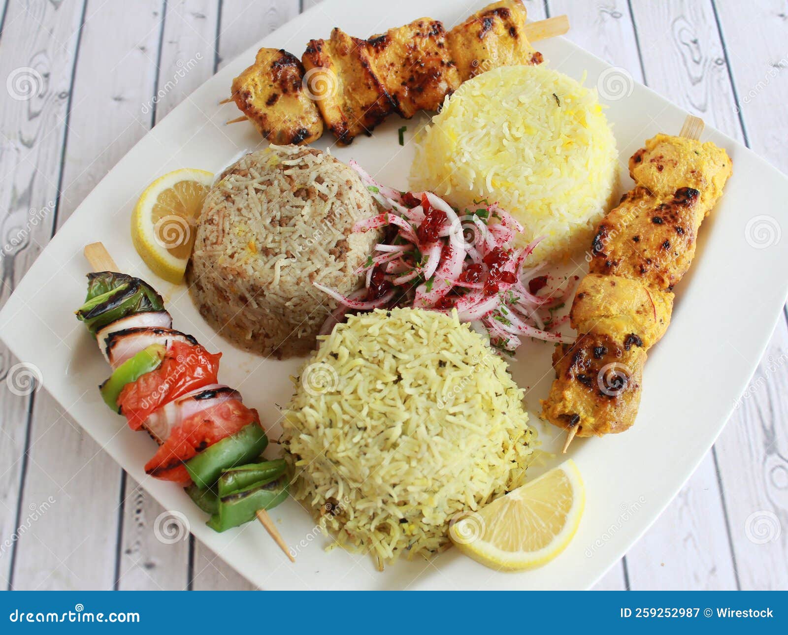 Top View of Chicken Barbeque and Three Kinds of Different Rice with