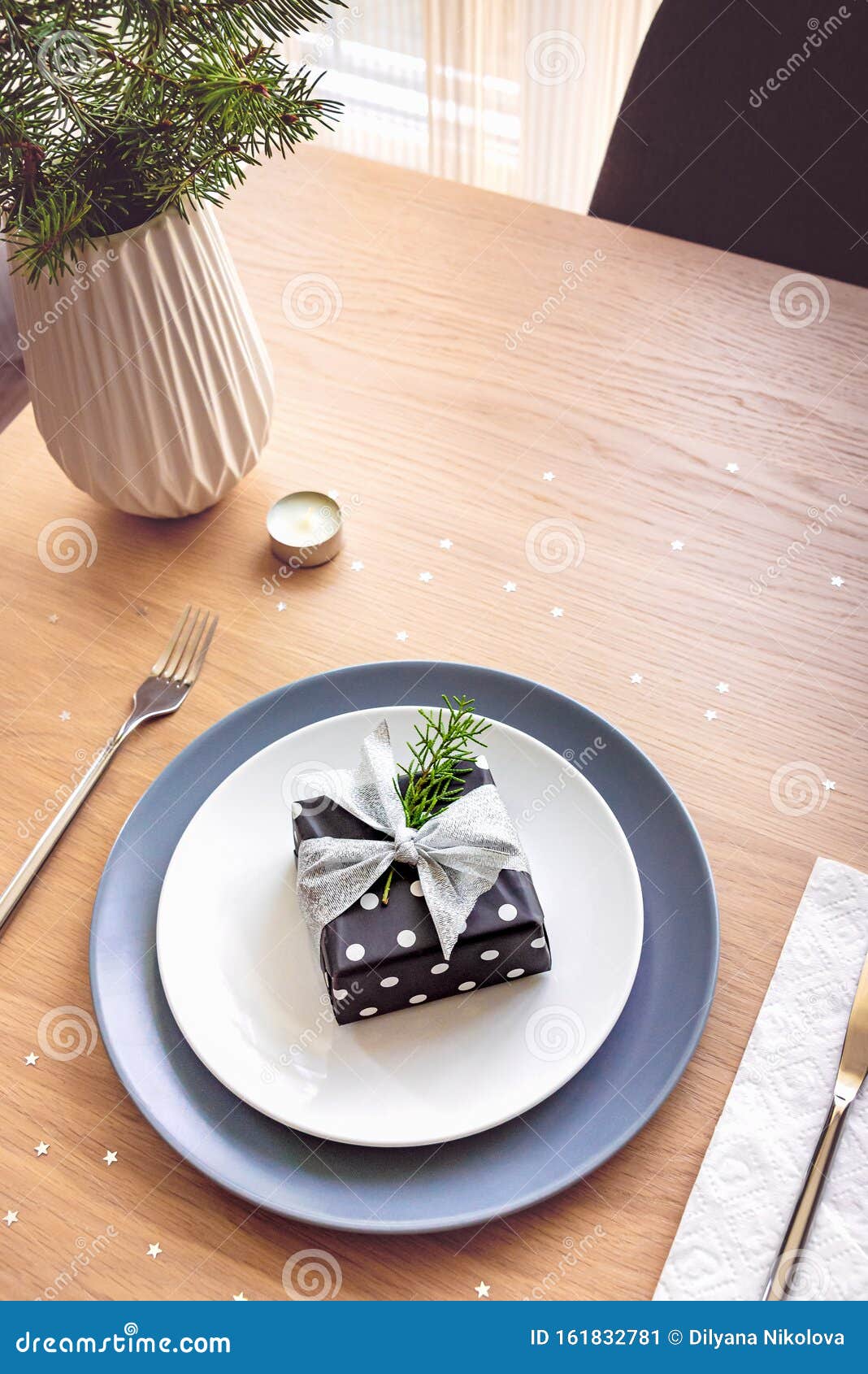 Top View of Christmas Table Setting. a Gift Box in a Plate Stock Image