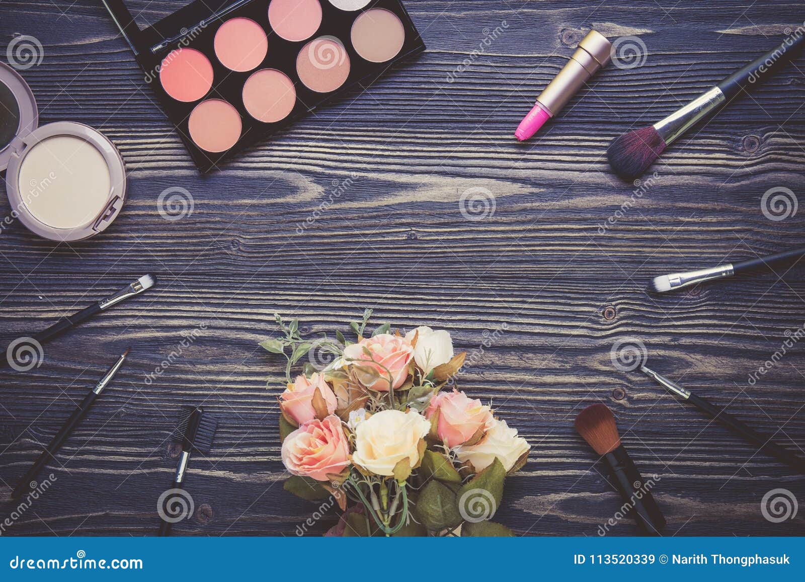 Top View a Collection of Cosmetic Makeup and Flower on Wooden Table ...