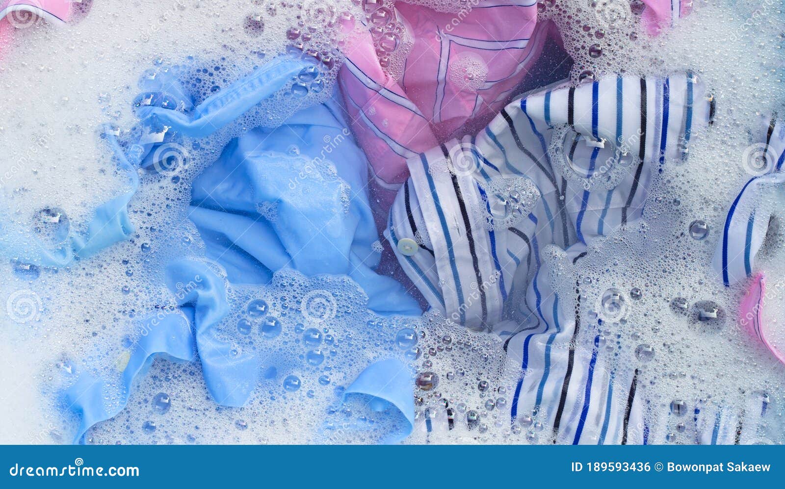 Clothes Soak in Powder Detergent Water Dissolution. Laundry Concept ...