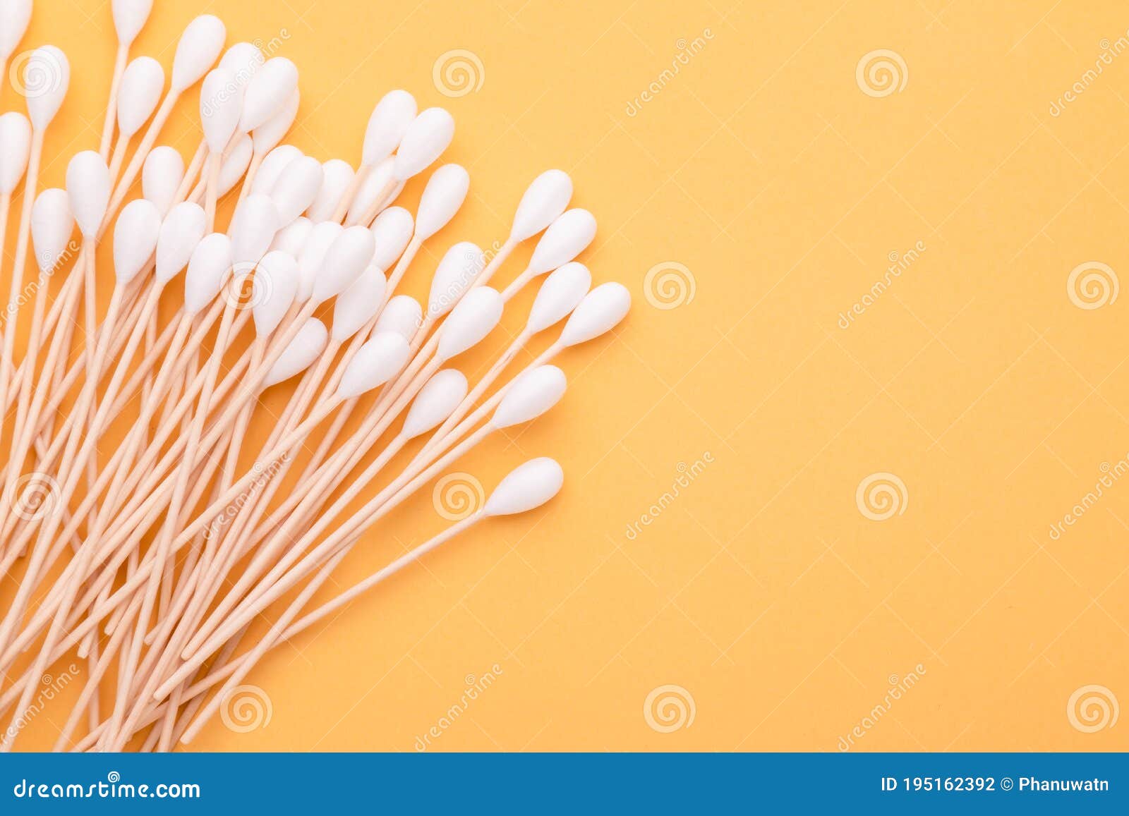 Top View Cotton Bud for Cleaning the Ears on Yellow Stock Photo Image