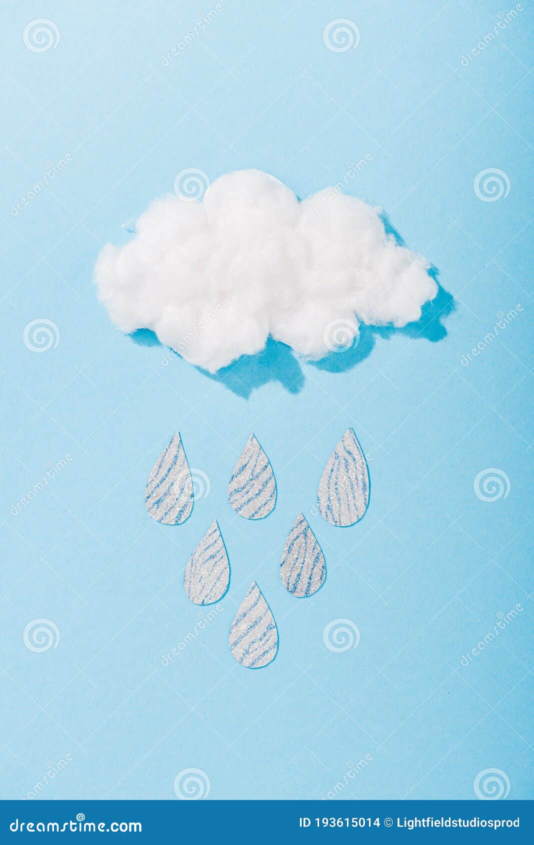 Top View of Cotton Candy Cloud with Glitter Raindrops Stock Photo