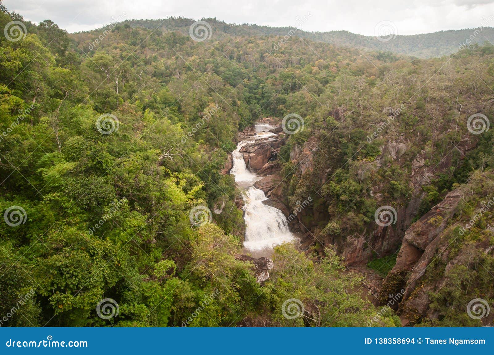 top view, the defile of tad huang waterfall river viewed. scenery tropical forest landscape. the properties of the two countries.