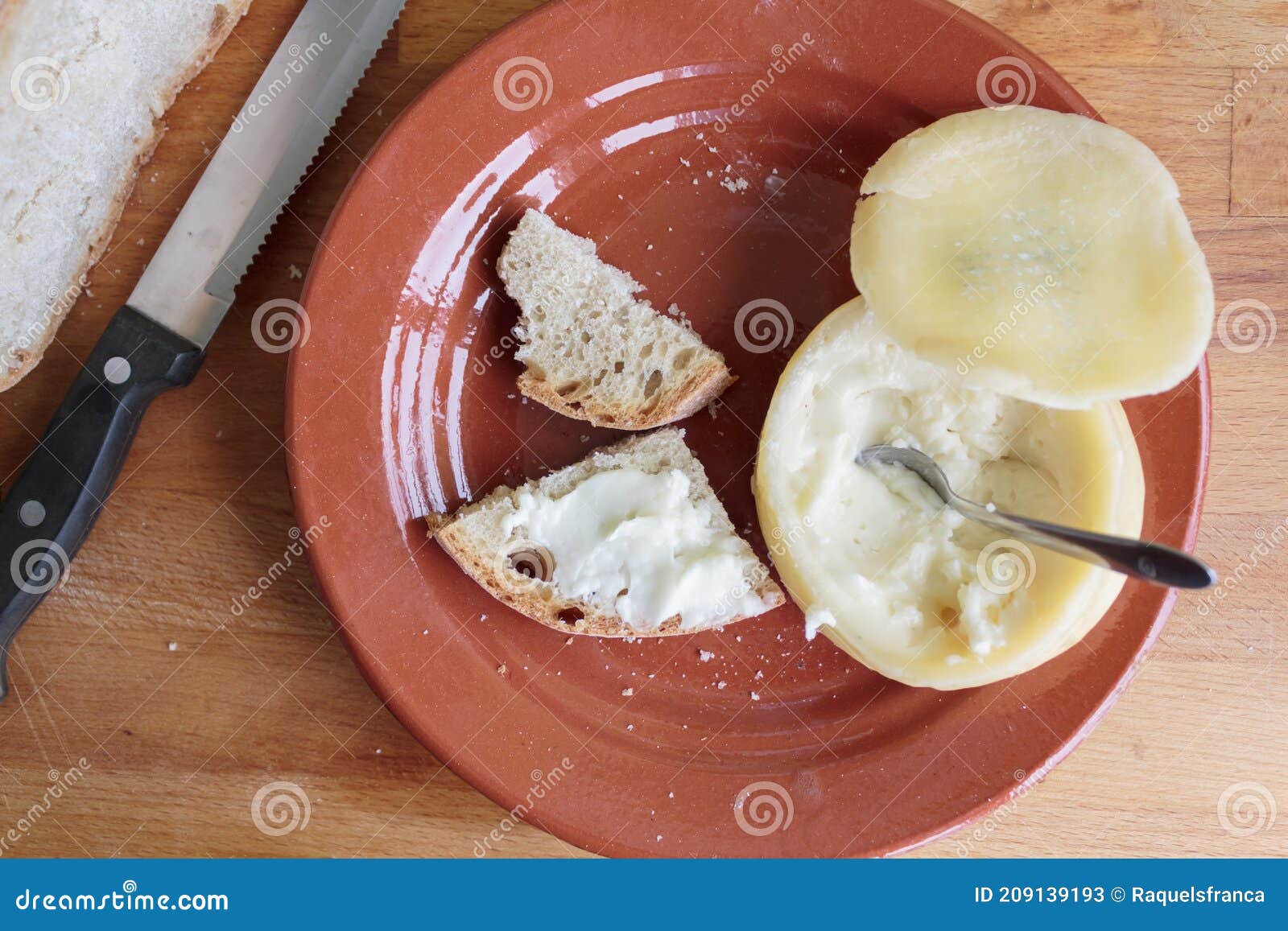top view of delicious creamy portuguese azeitao cheese with bread