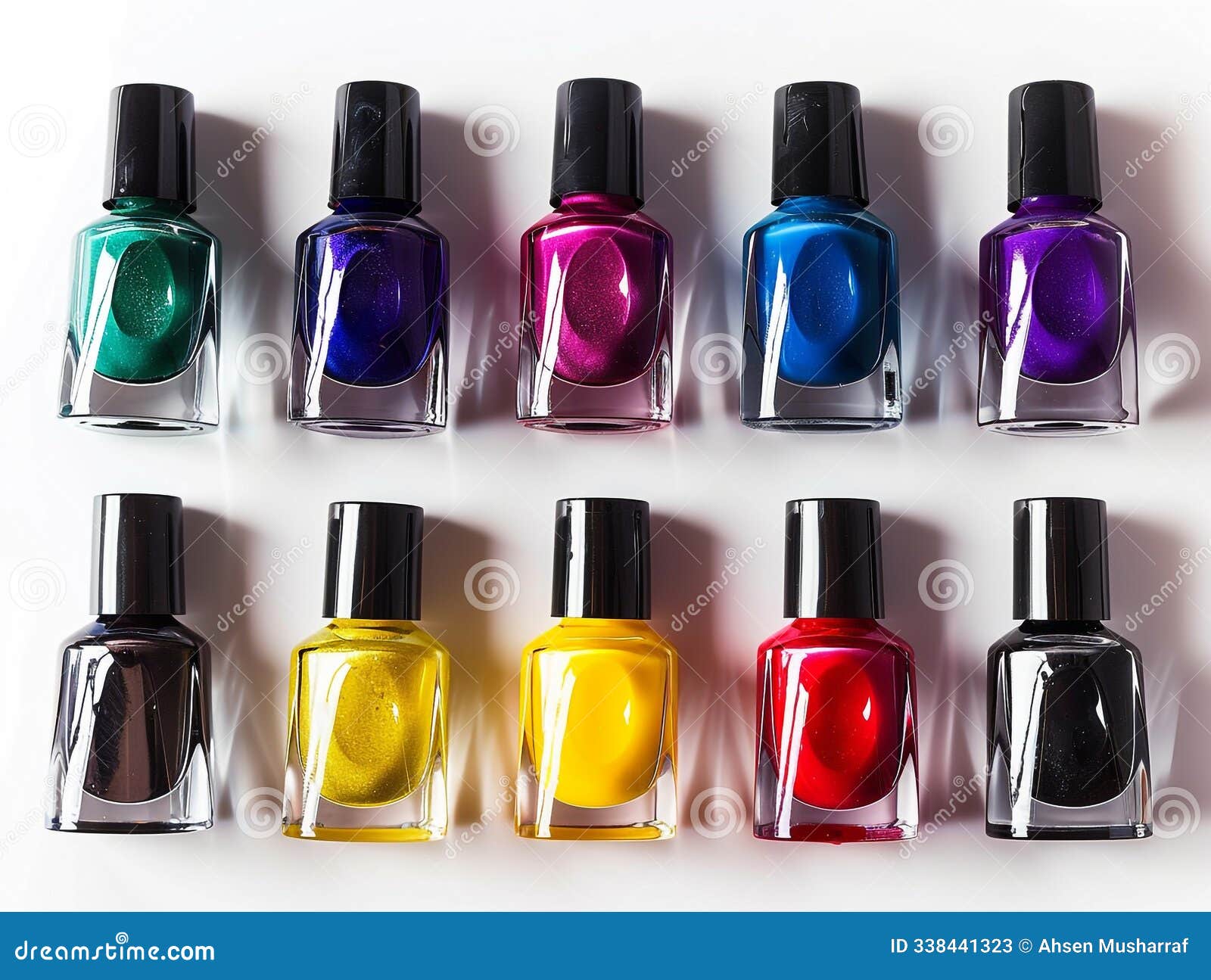 top view of different color vertical nail polish with solid white background