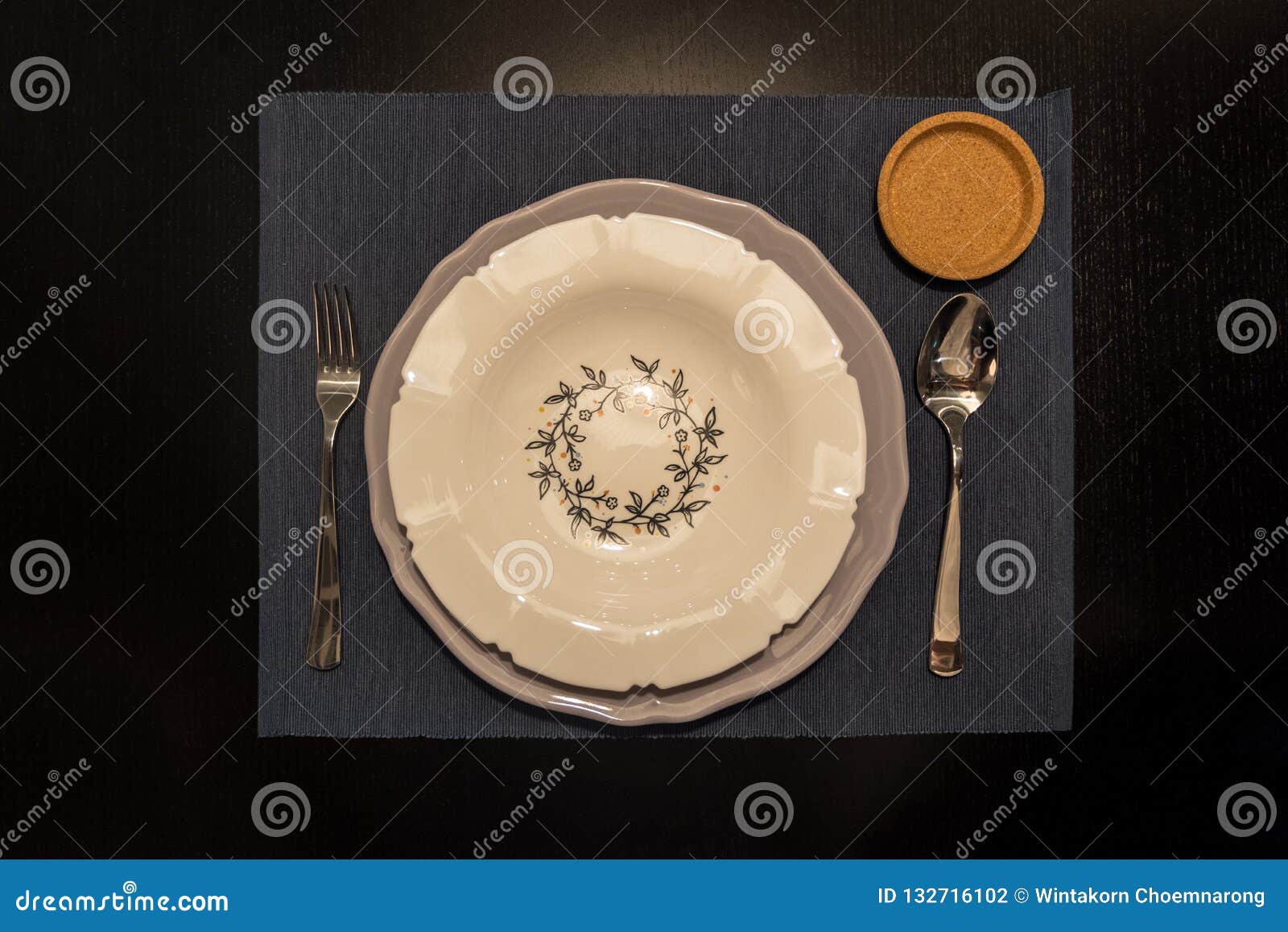 Top View of Dinner Place Setting. a White Plate on Wooden Table Stock
