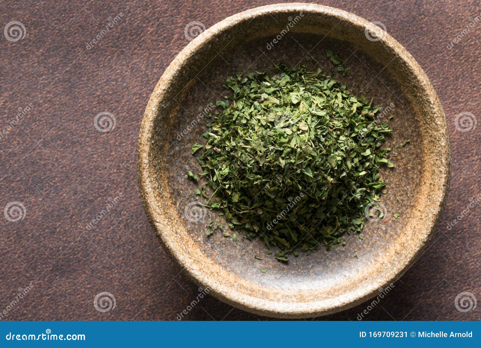 Dried Cilantro in a Bowl stock image. Image of isolated 169709231