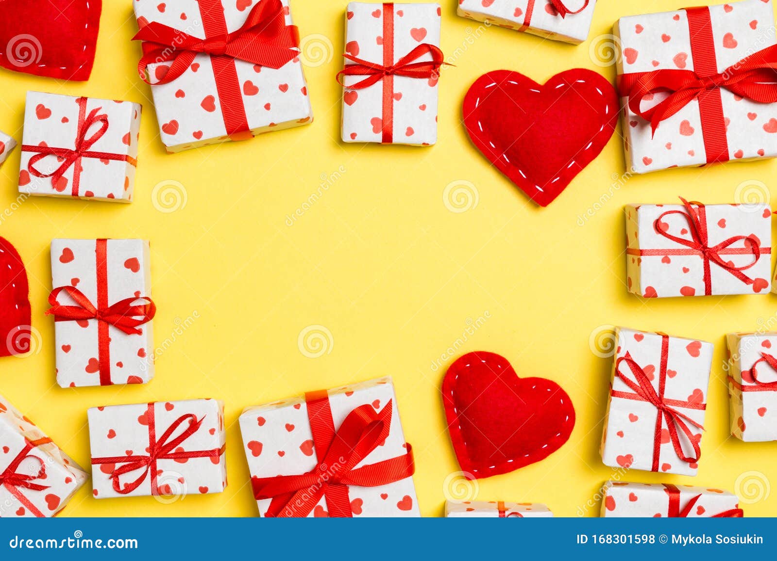 Top View of Festive Gift Boxes and Red Textile Hearts on Colorful ...
