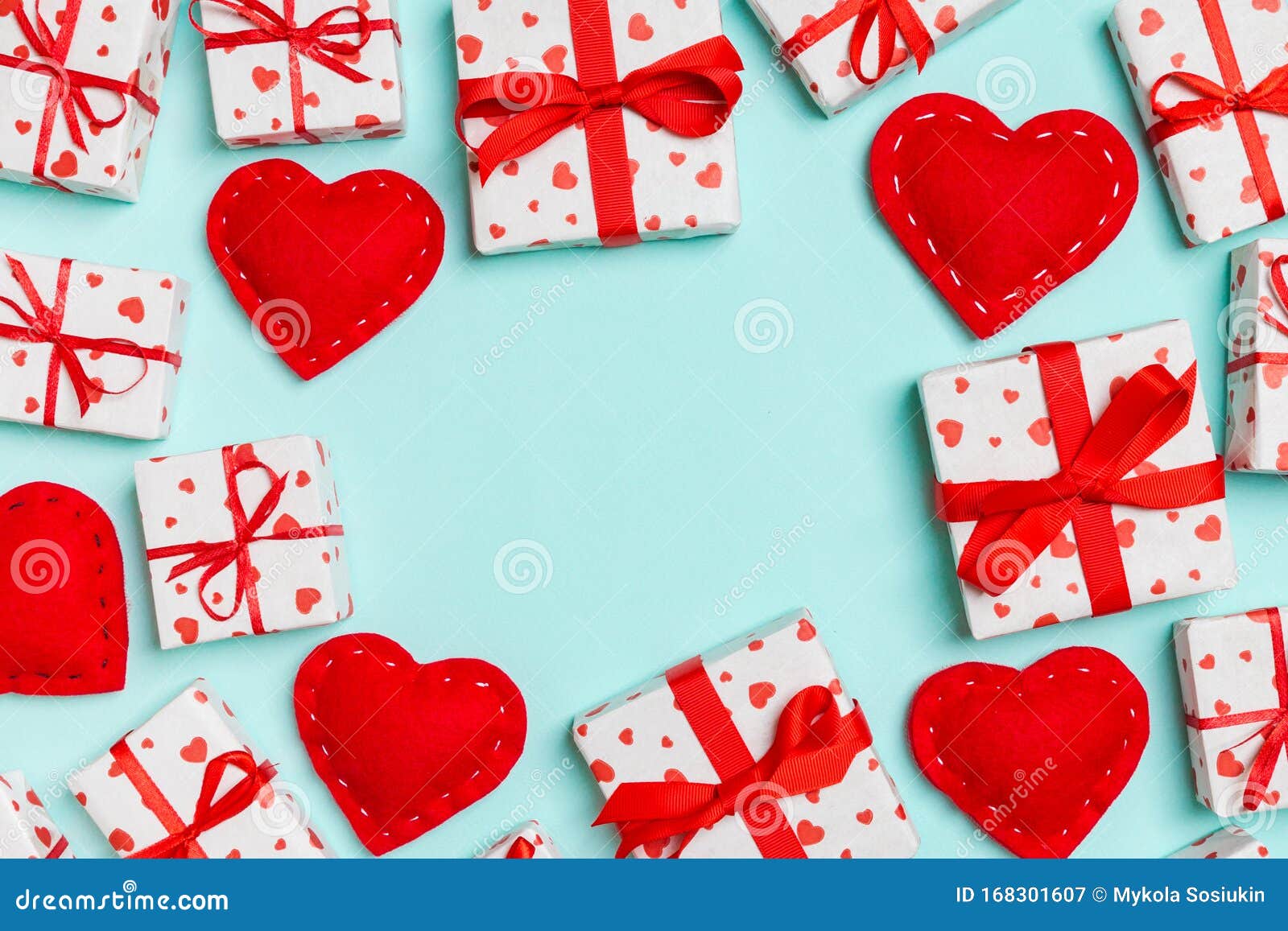 Top View of Festive Gift Boxes and Red Textile Hearts on Colorful ...