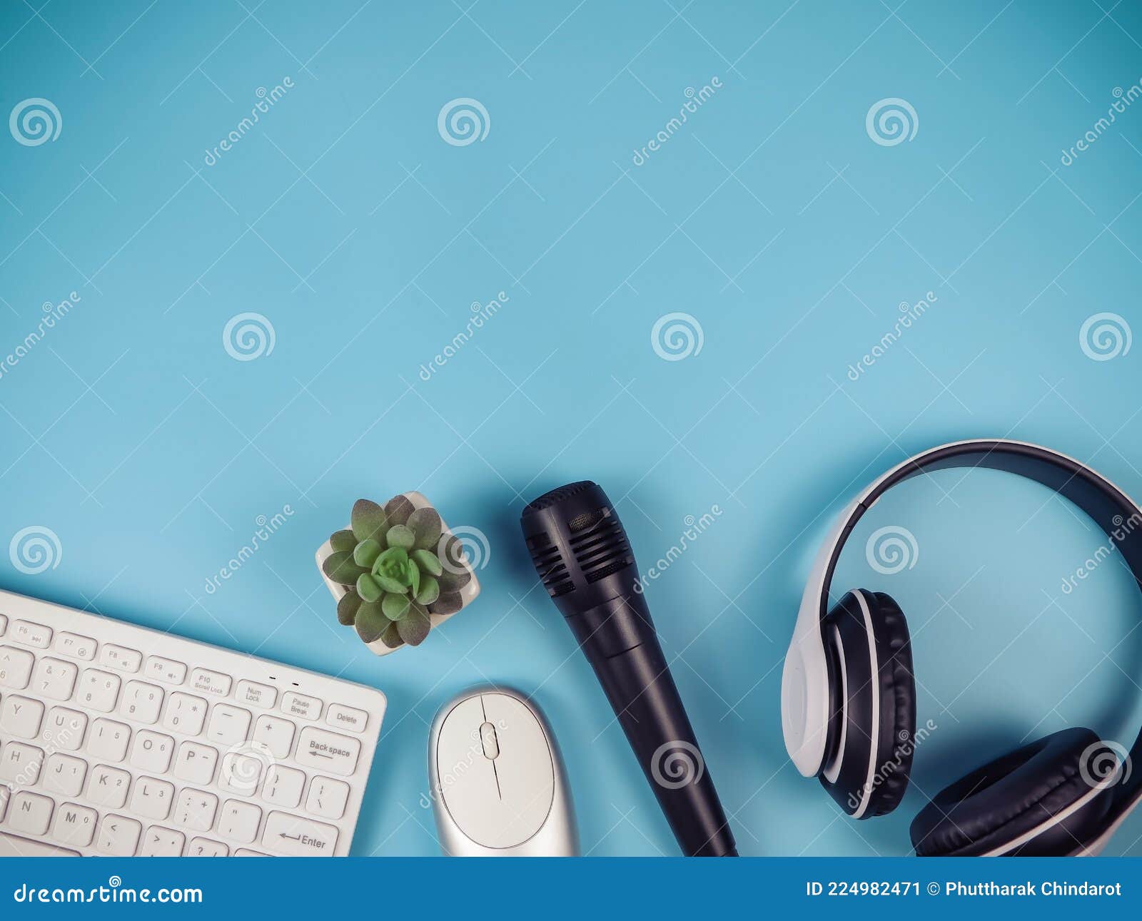 Flat Lay of Computer Keyboard Mouse, Headphones, Microphone and Cactus