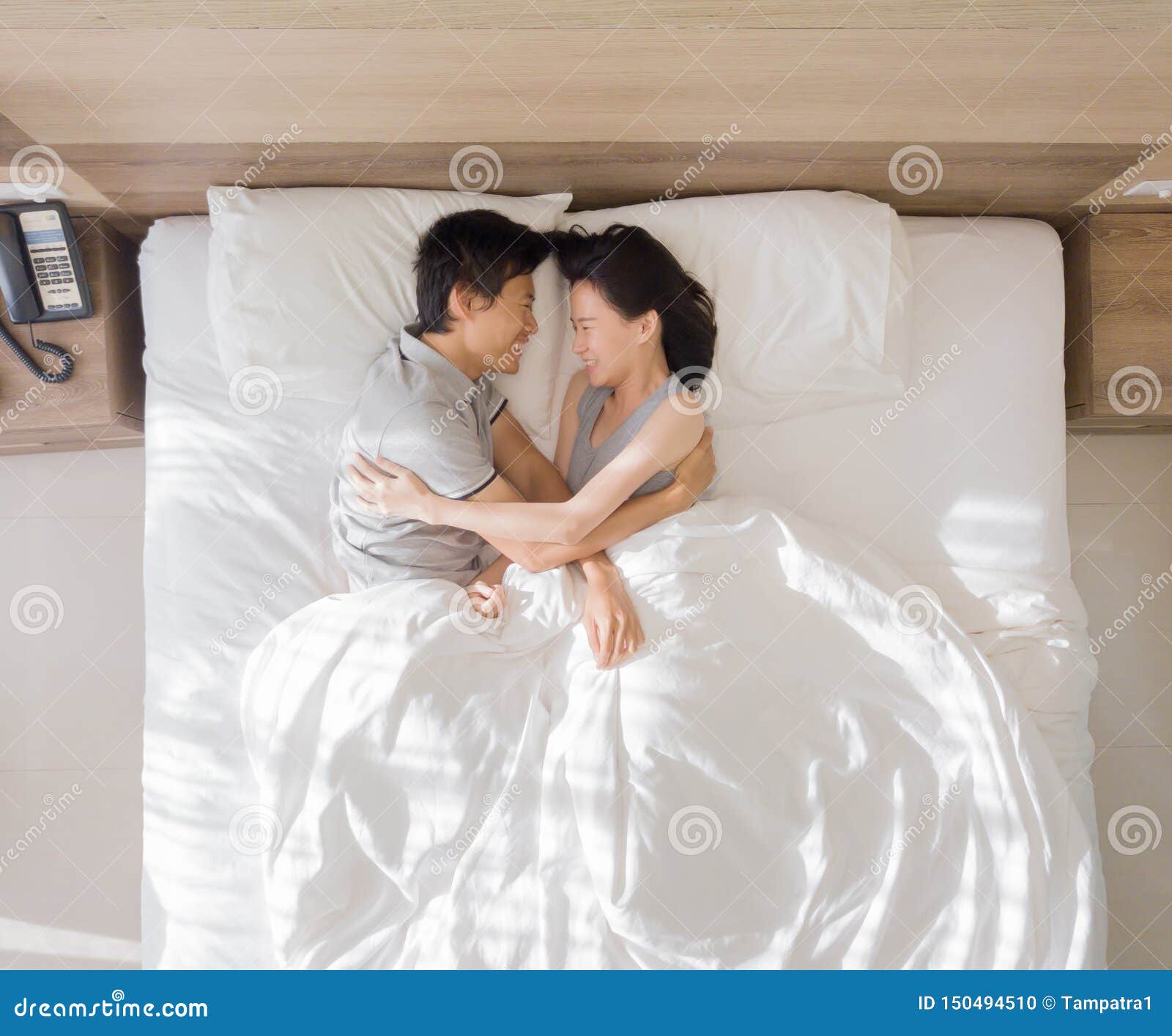 Top View of Happy Asian Couple Smiling, and Sleeping Together on Bed in  Love and Sex Concept in a Modern Bedroom with White Stock Photo - Image of  boyfriend, cheerful: 150494510