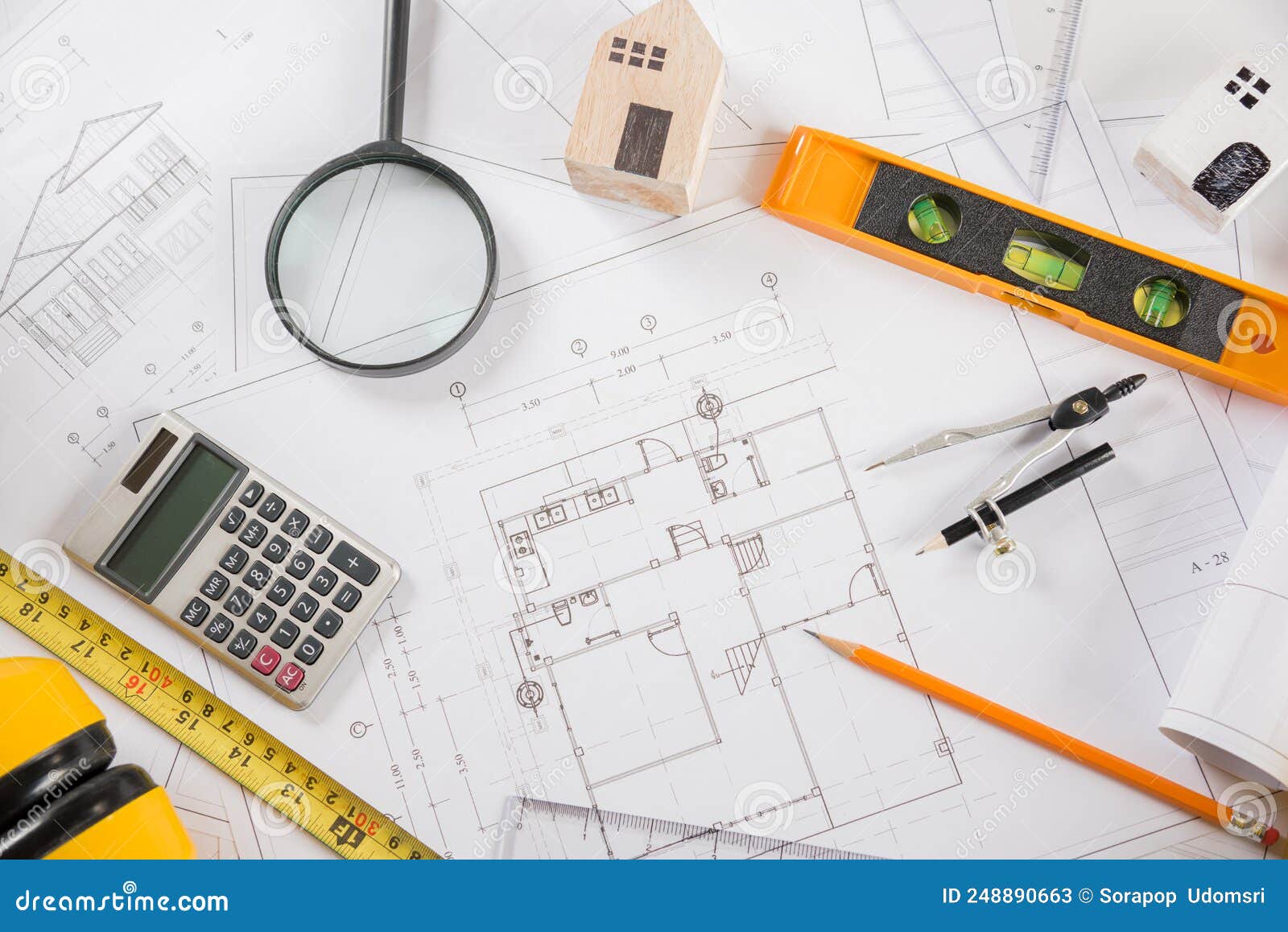 top-view-of-house-plan-blueprint-paper-with-repair-tools-on-table-desk