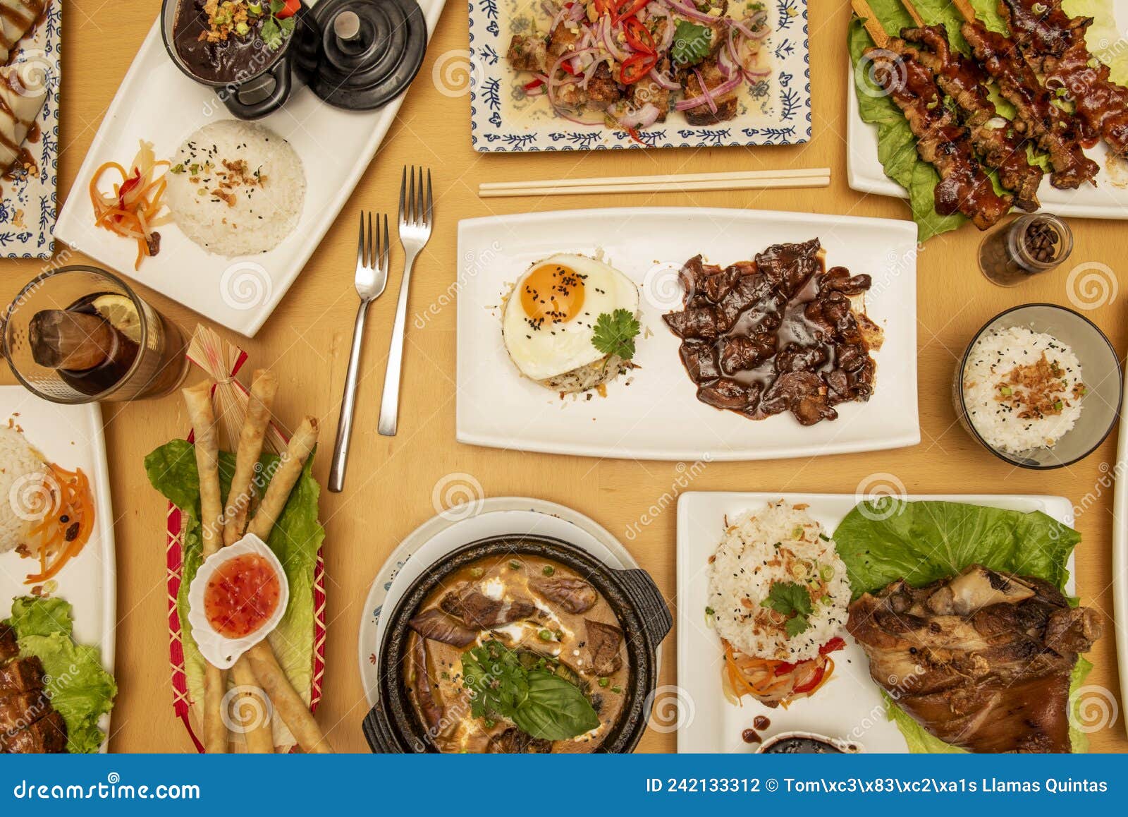 top view image of asian food dishes, tagalog, spring rolls, roast beef