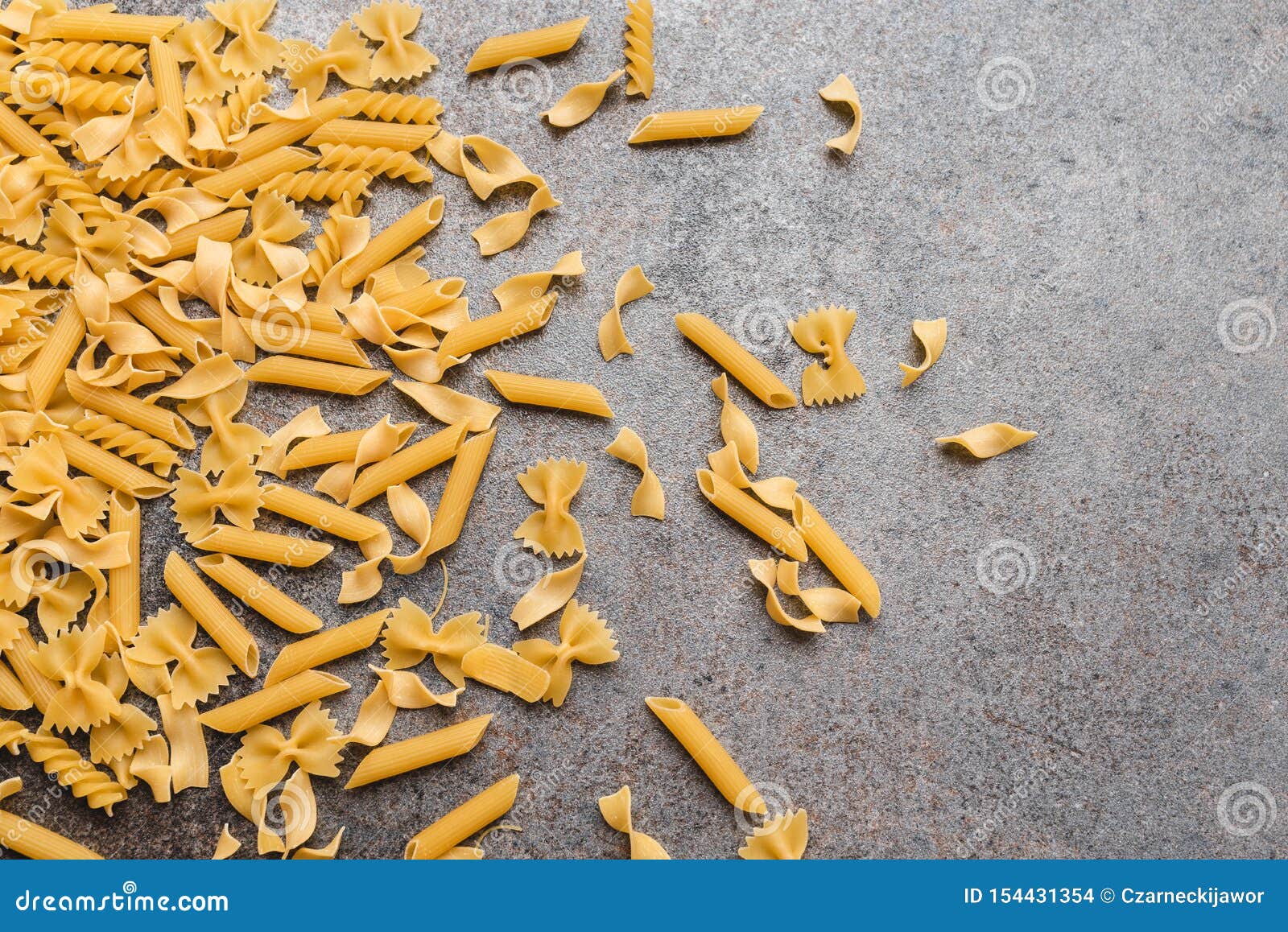 Top View of Macaroni Arranged on an Interesting, Textured Background