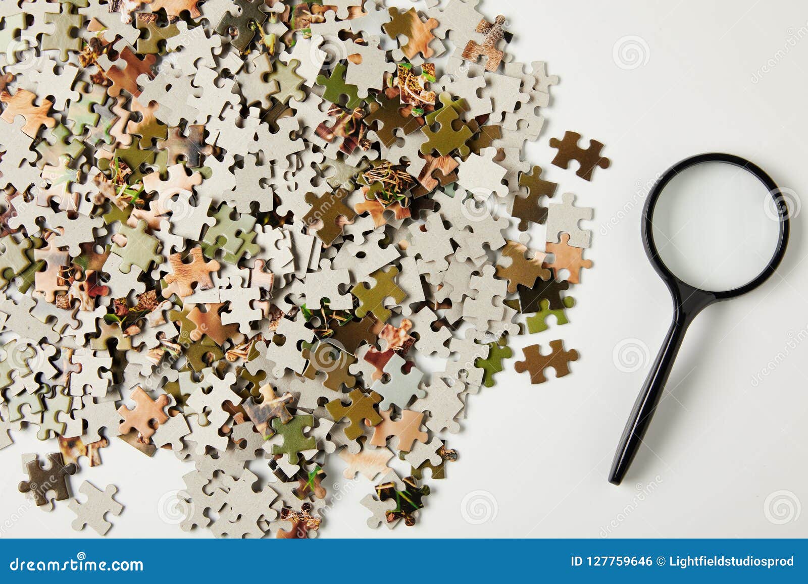 Top View of Magnifying Glass and Jigsaw Puzzle Pieces on Grey Stock Photo Image of