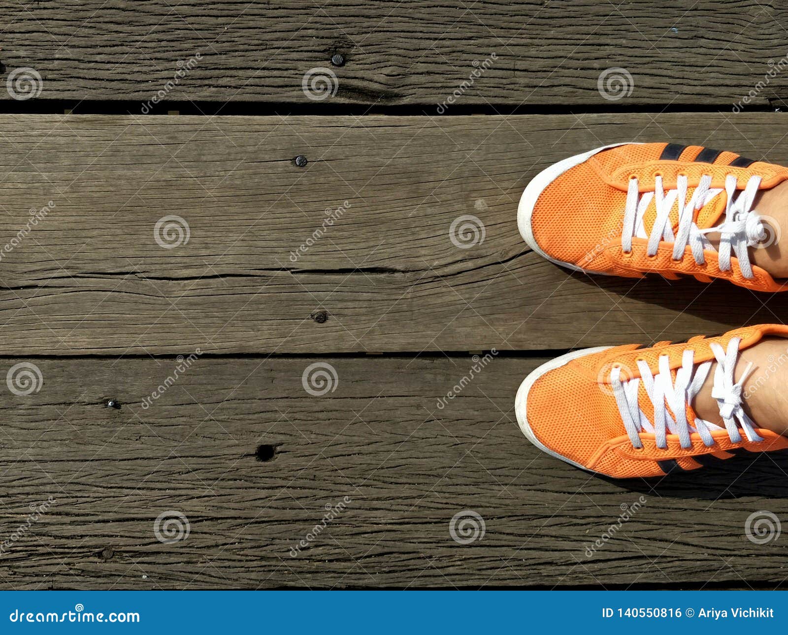 Top View of Man Orange Sneakers Standing on Wooden Bridge Old. Stock ...