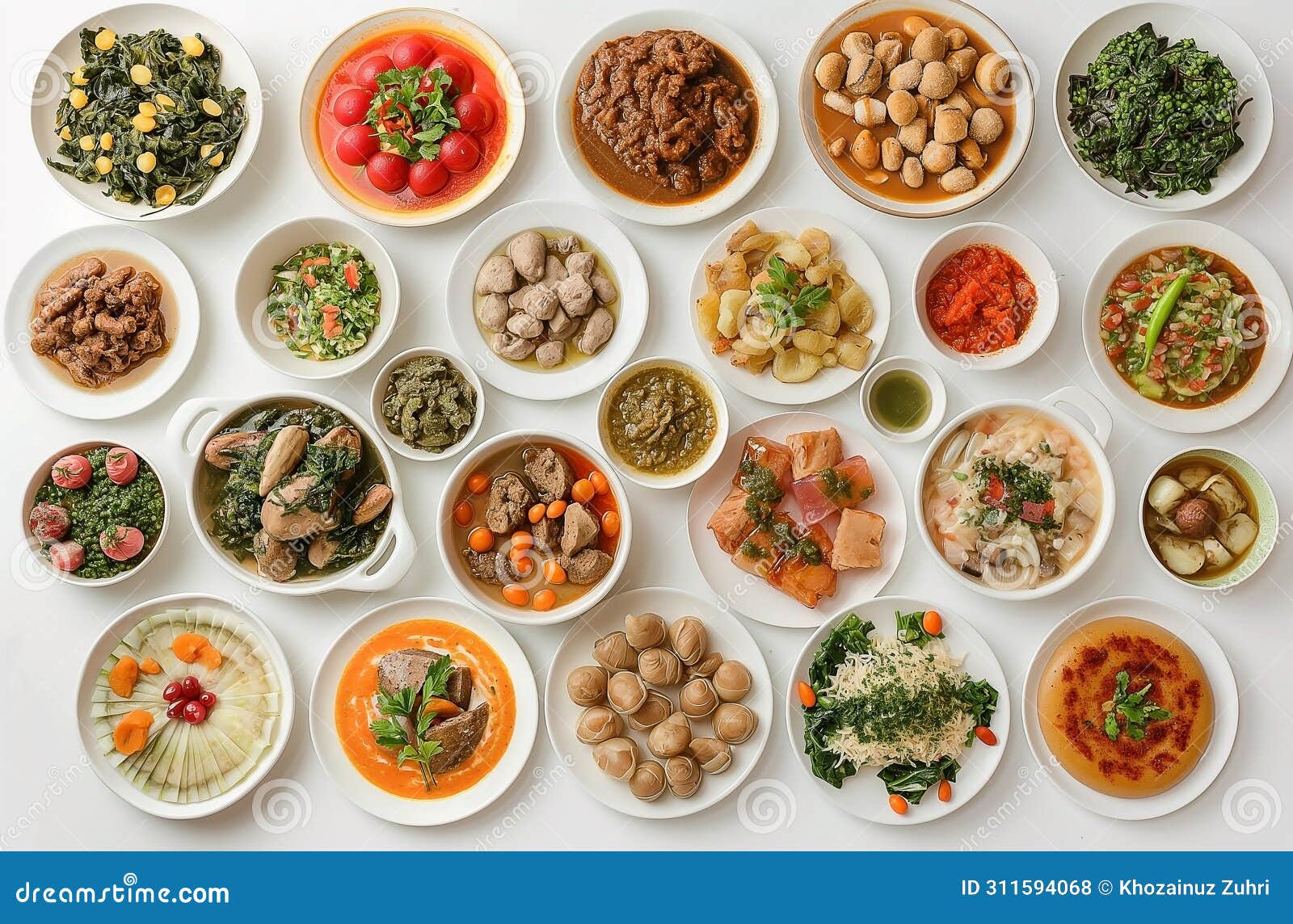 top view of many plates on dinner dishes from different dishes covered in sauce on white background