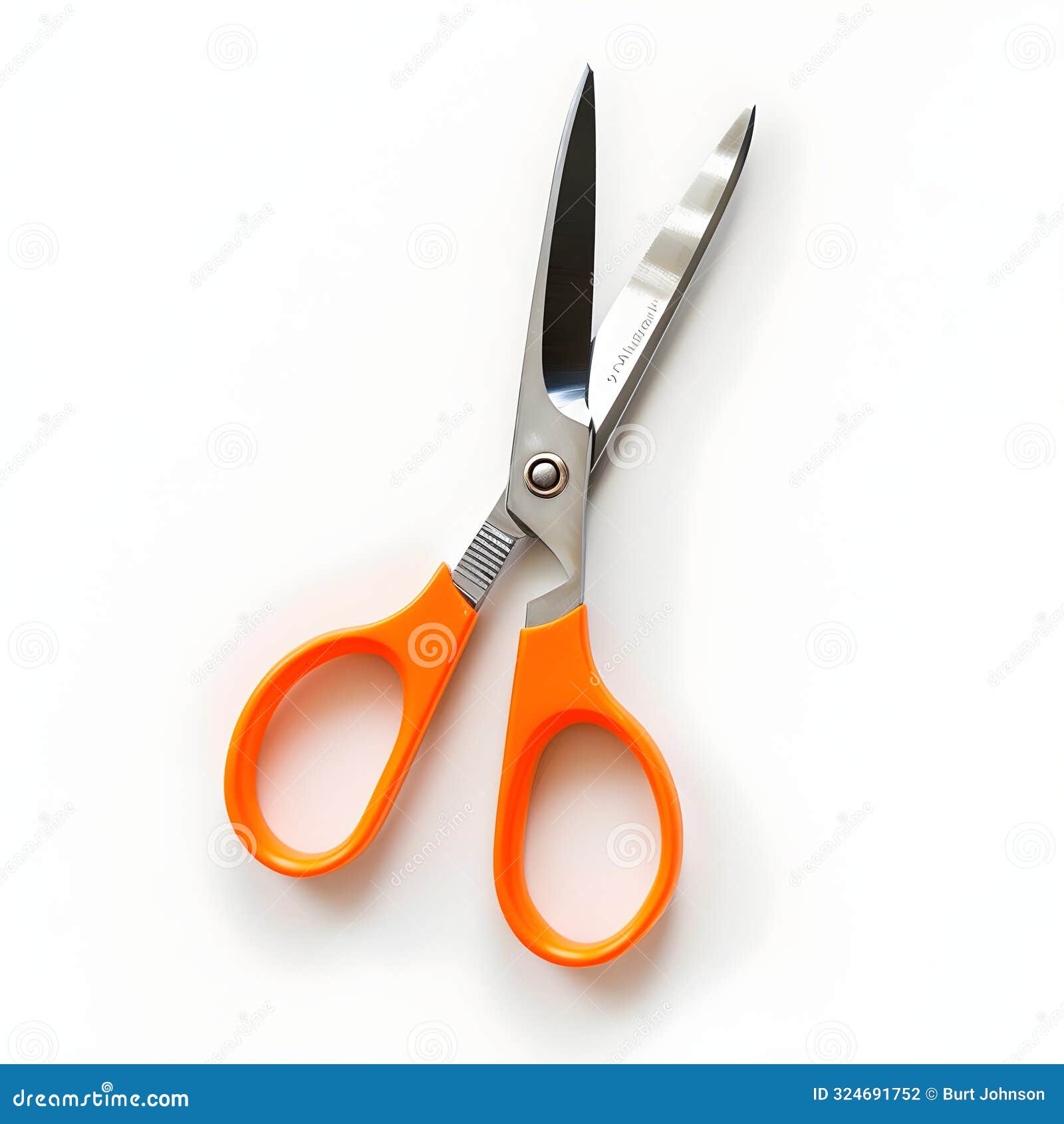 orange handled scissors on white background