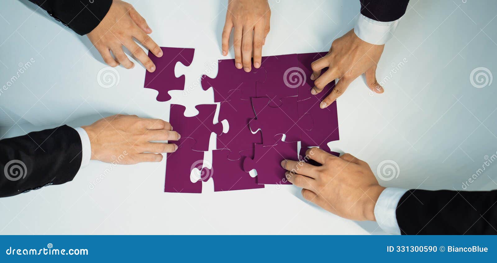 top view panorama banner of business team assembling jigsaw puzzle. shrewd