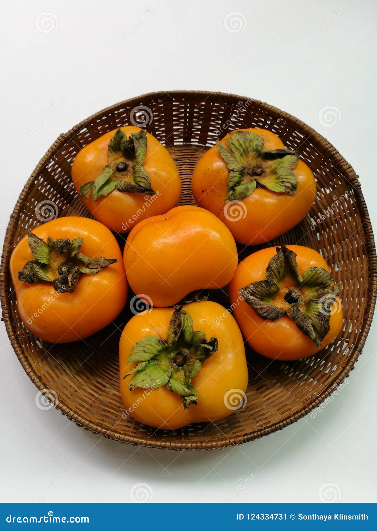 Persimmon fruit in basket stock image. Image of sweet 124334731