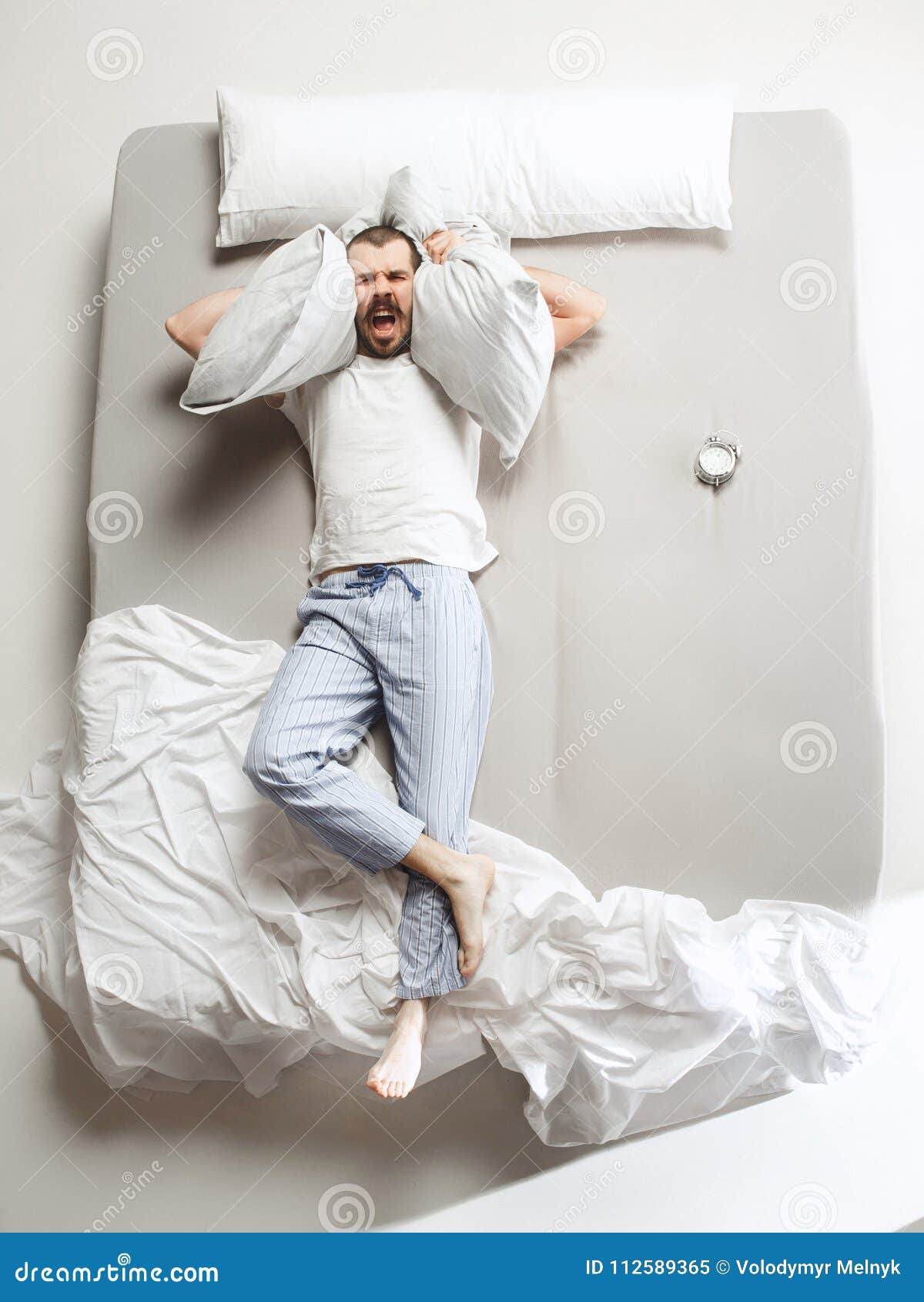 Top View Photo of Young Man Sleeping in a Big White Bed Stock Image ...