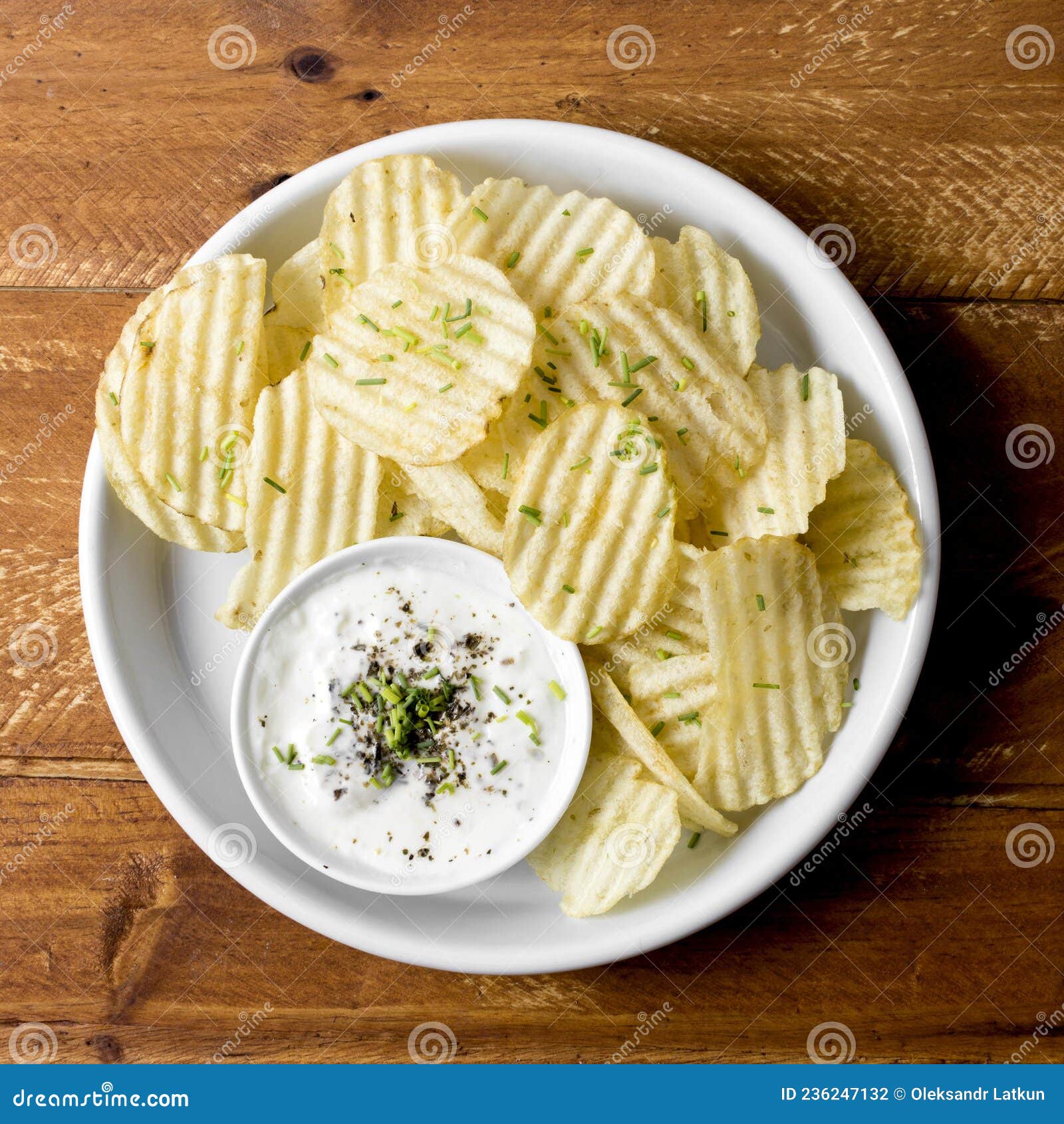 Top View Potato Chips Plate with Sauce. High Quality Photo Stock Photo