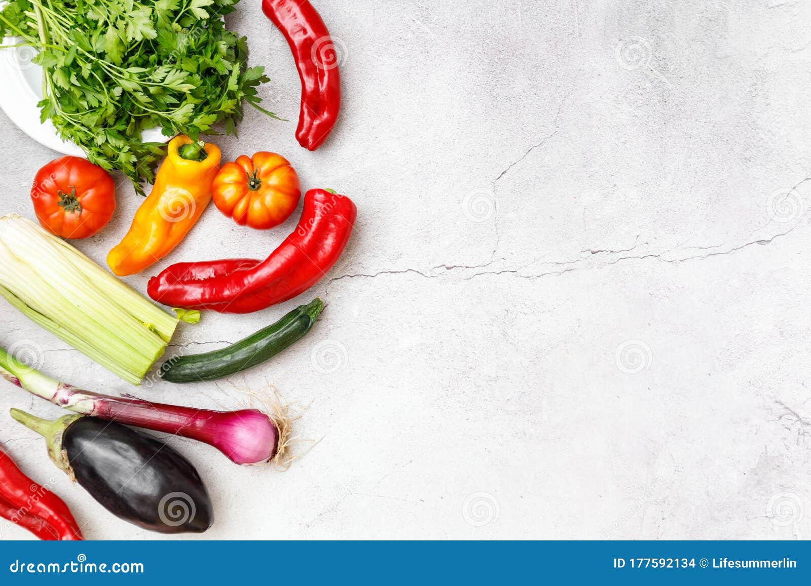 top view of raw vegetables. fresh ball peppers, tomatoes, onion, aubergine and parsley. copy space for your text