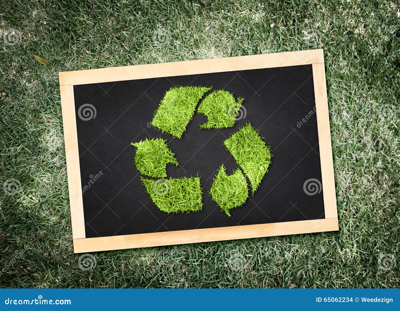 top view of recycle  on blackboard with desaturated green