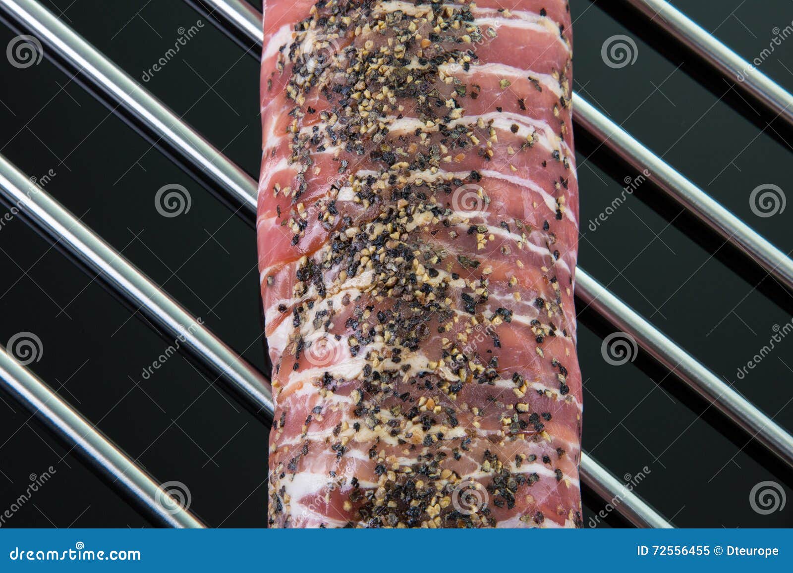Top View from a Roast Porkwith Pepper on a Cooking Grate Stock Image