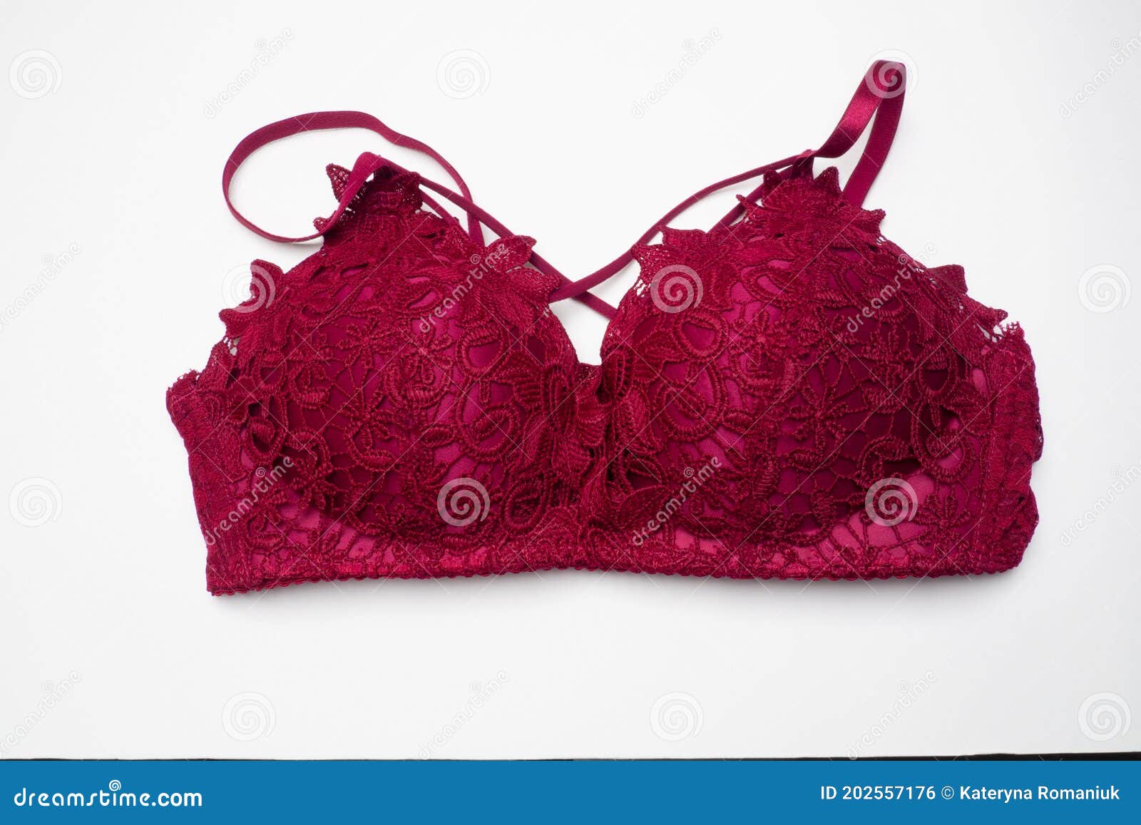Top View Dark Red Bra on a White Background.Background with