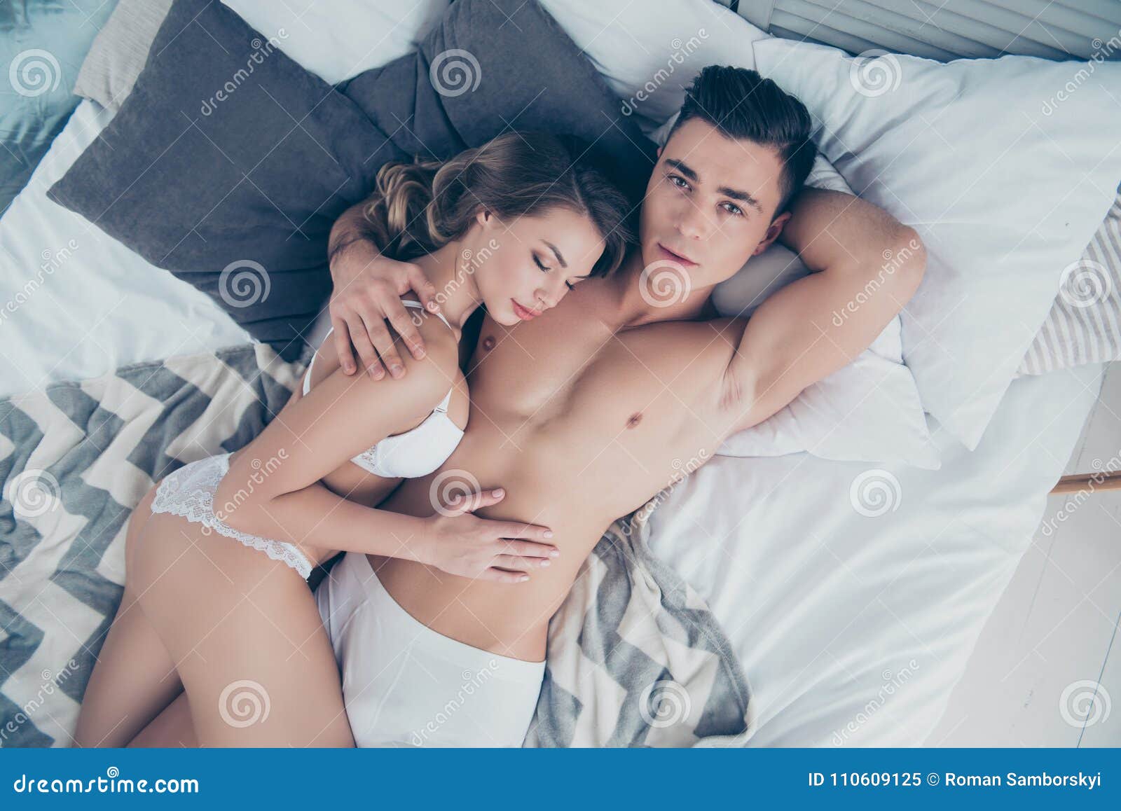 Top View of Husband and Wife, Relaxing in Bed, Woman Sleepi Stock Image picture