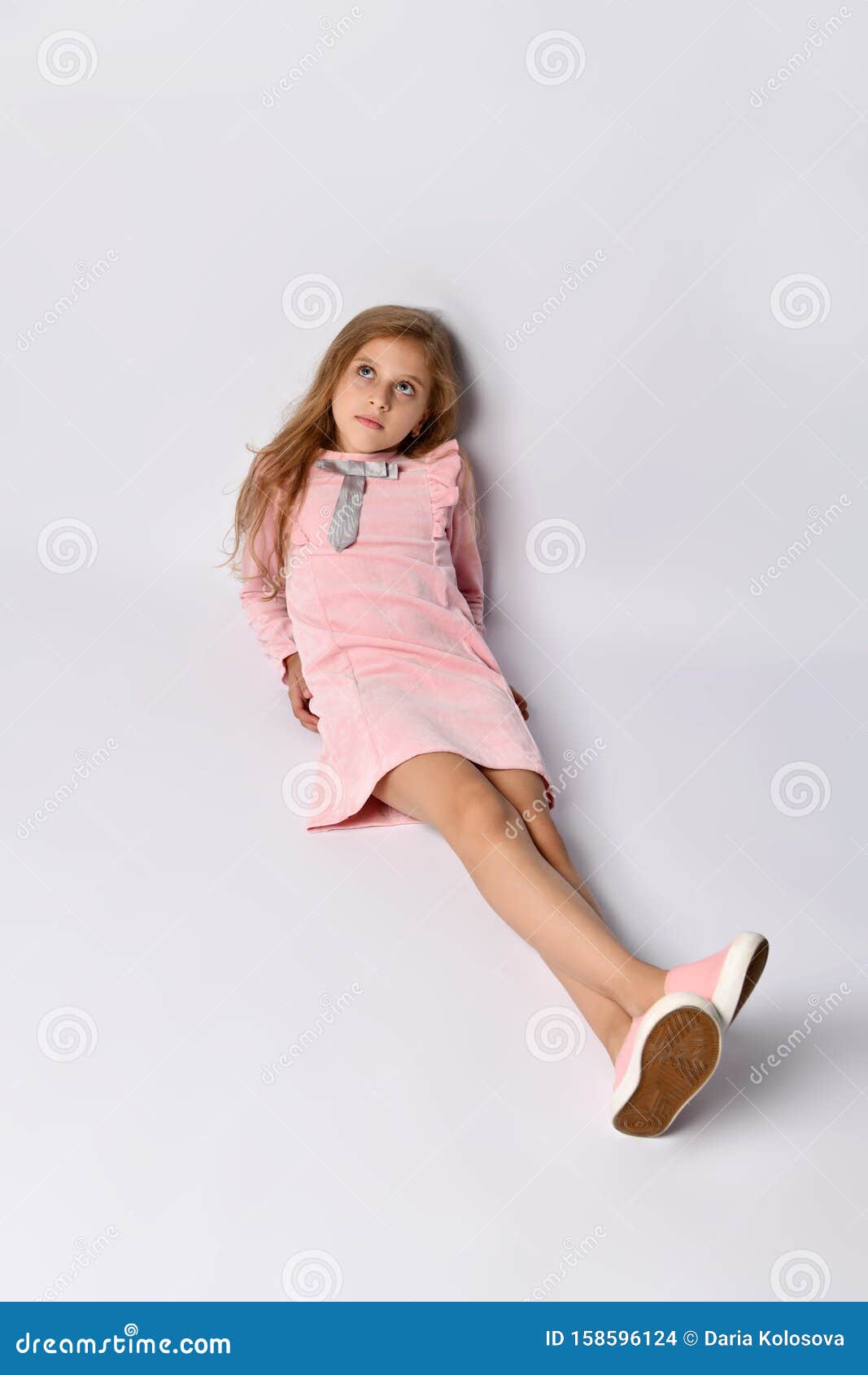 Teenager Girl in a Casual Pink Dress ...