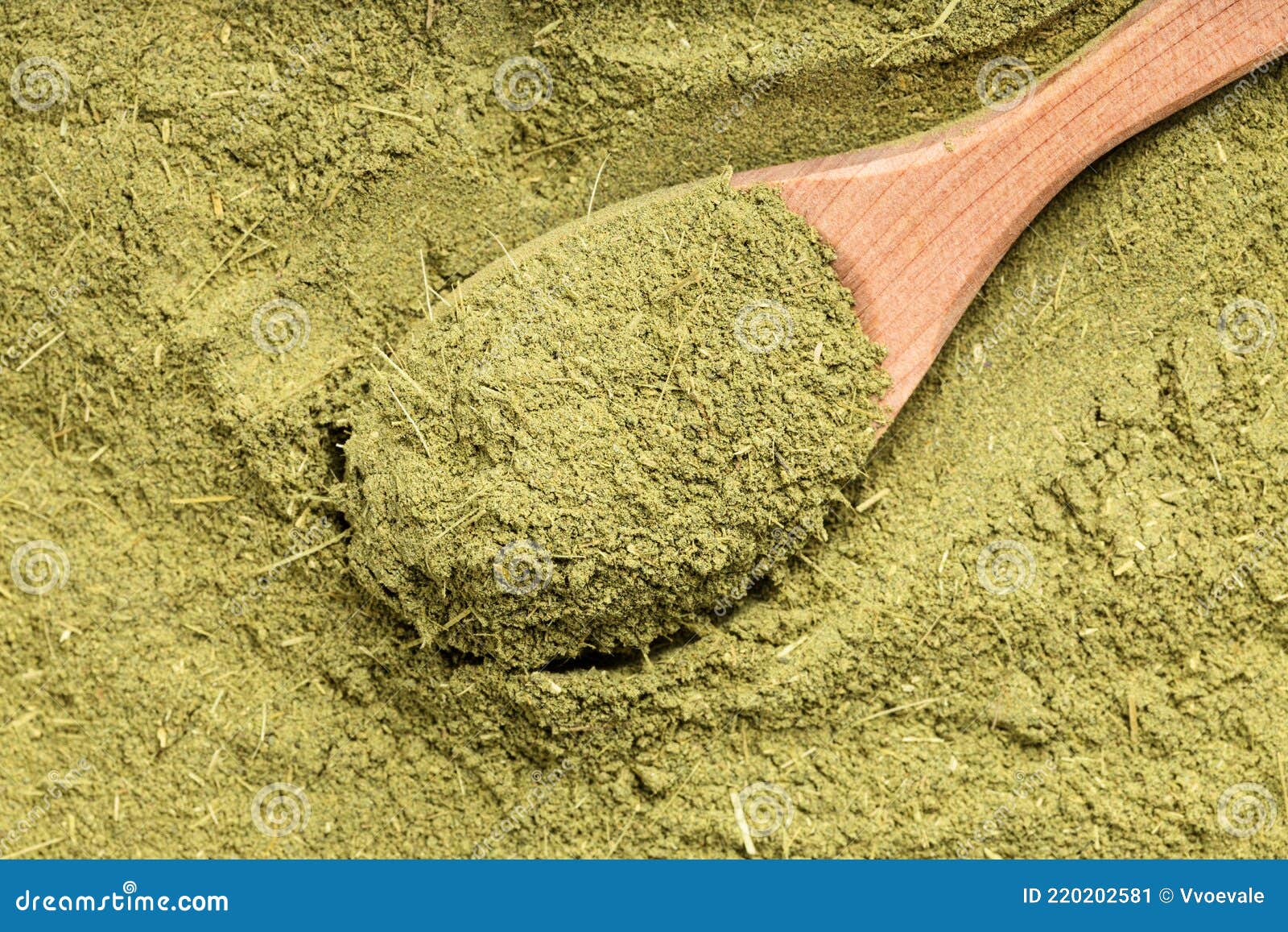 top view of wood spoon with milled stevia grass