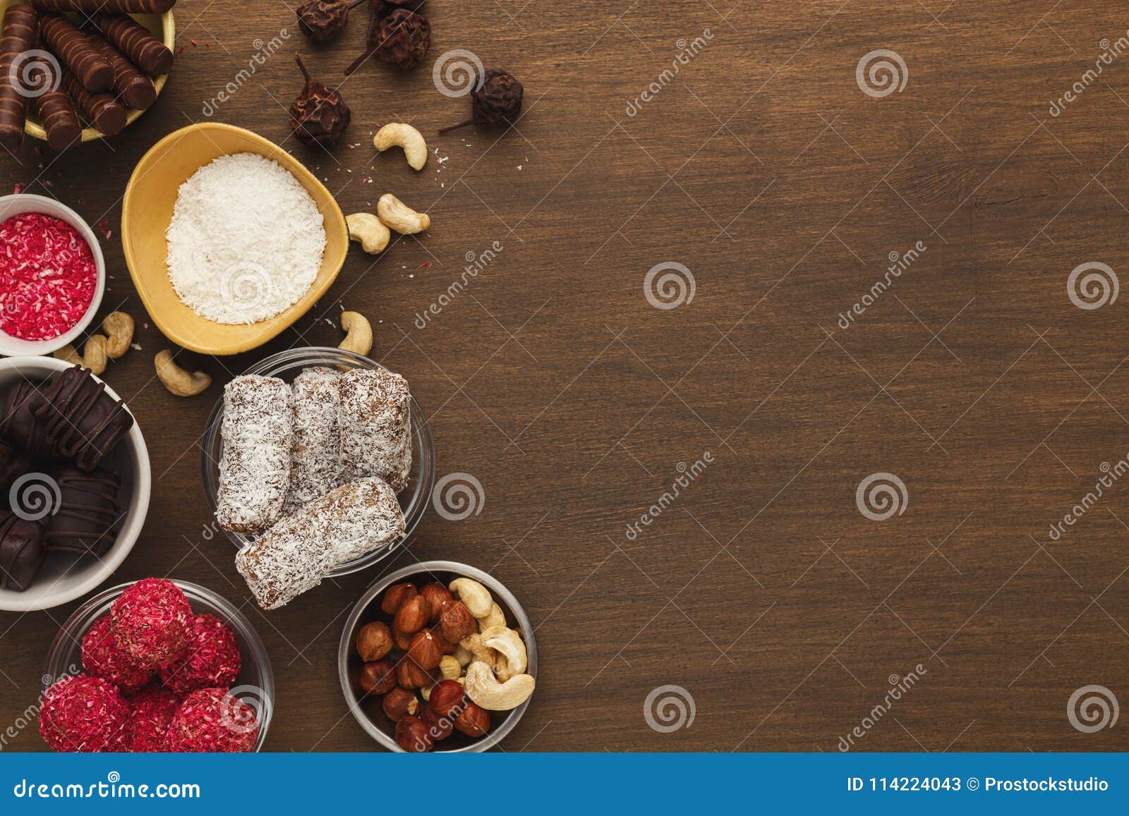Wooden Desktop With Assortment Of Healthy Sweets And Nuts Stock