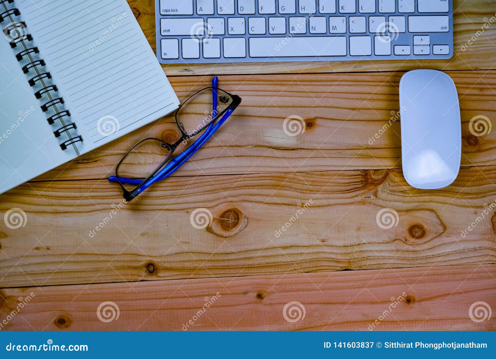 Top View Of Working Desk Table With Keyboard Mouse Notebook