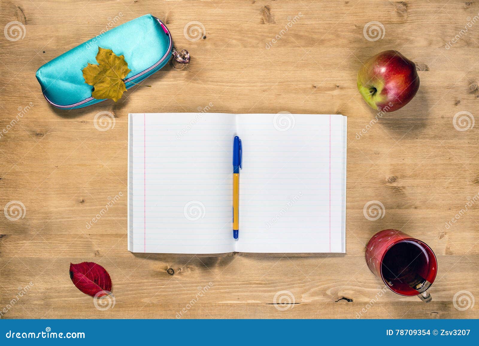 Top View Workspace Of The Student With Opened Copybook Case Pen