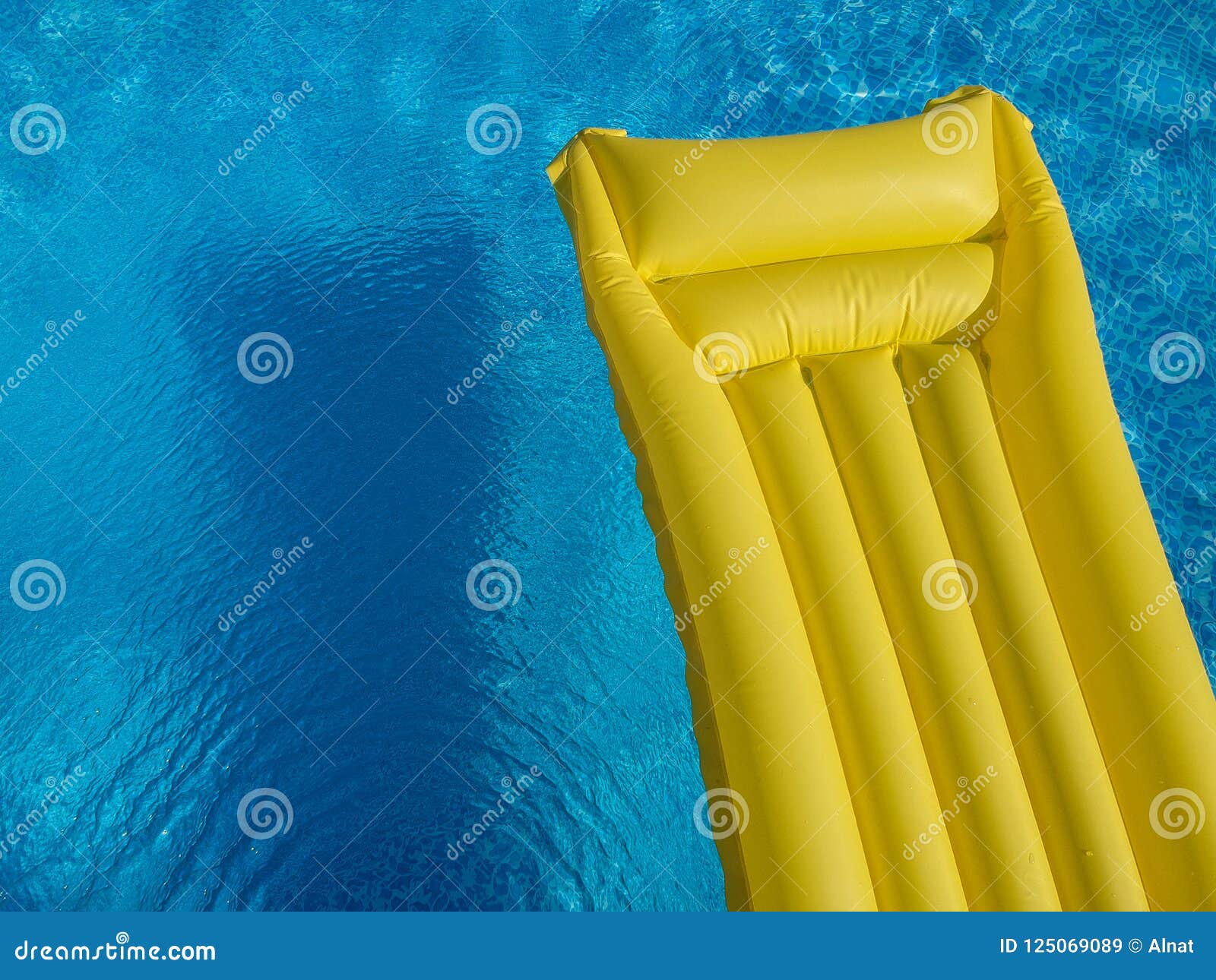 Top View of an Inflatable Mattress in a Backyard Swimming Pool Stock ...