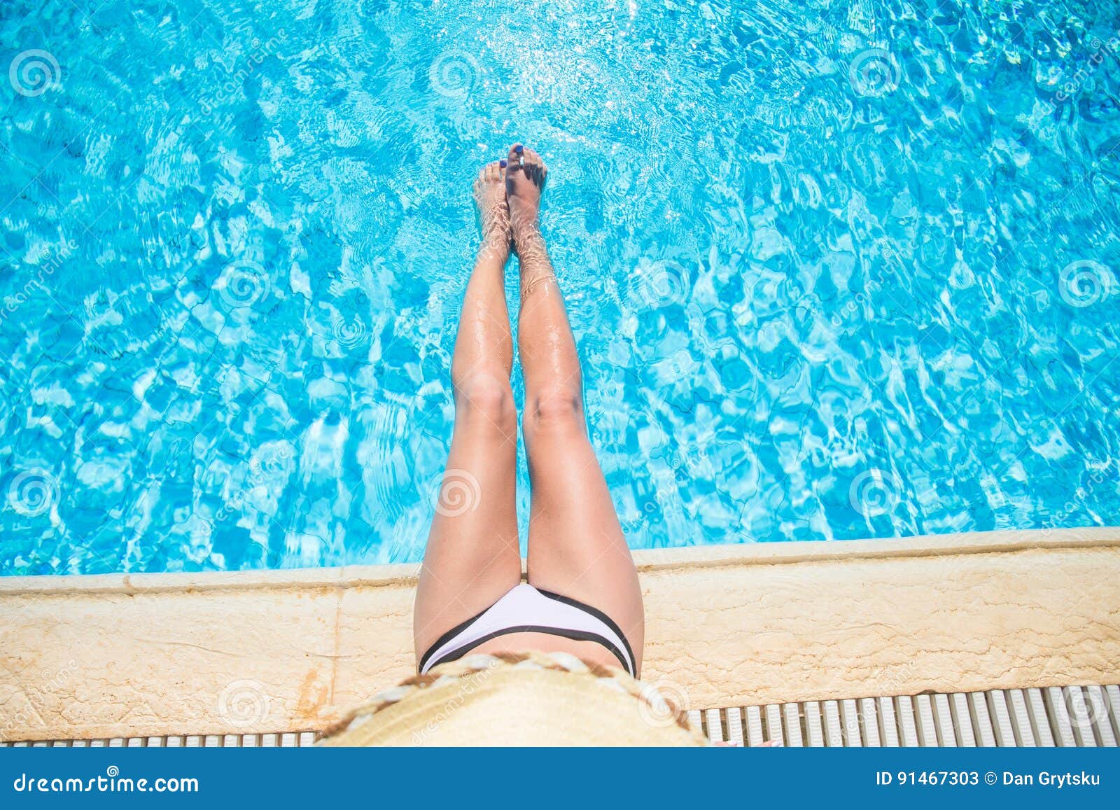 Top View Young Woman Sunbathing Near Swimming Pool Top View Of Legs Near Pool Stock Image