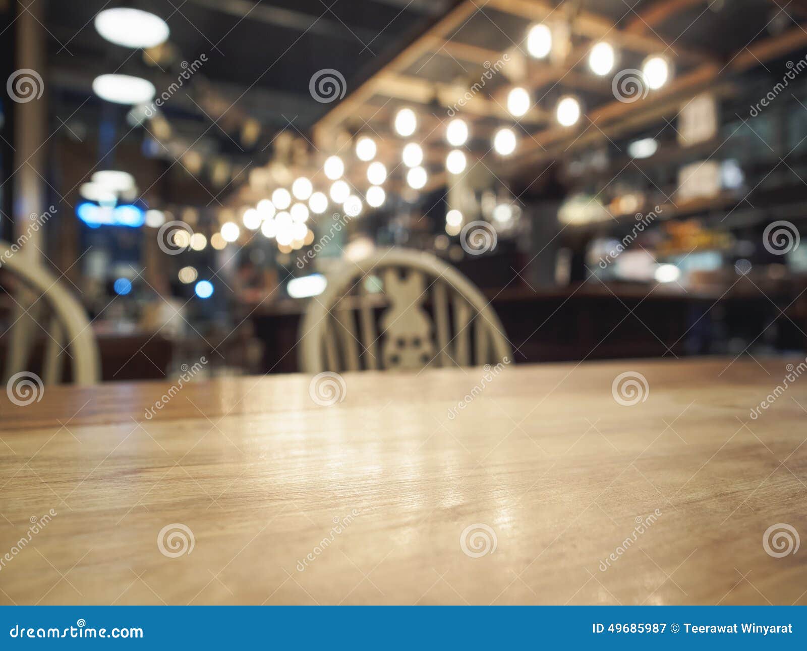 Top Of Wooden Table With Blurred Bar Restaurant Background 