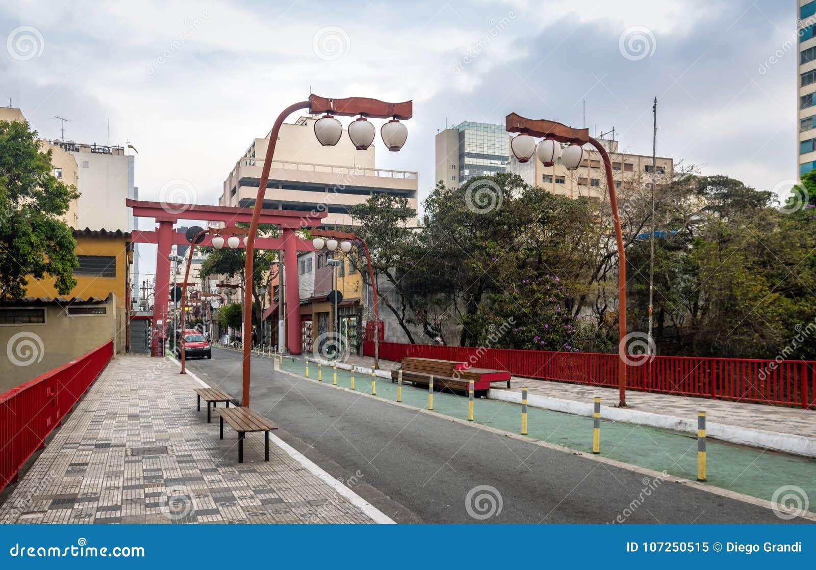 torii gate at liberdade avenue in liberdade japanese neighborhood - sao paulo, brazil